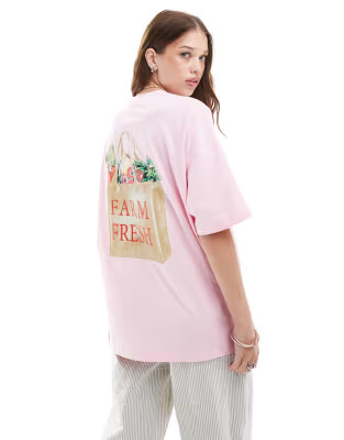 ASOS DESIGN oversized t-shirt with farmers market graphic in baby pink | ASOS (Global)