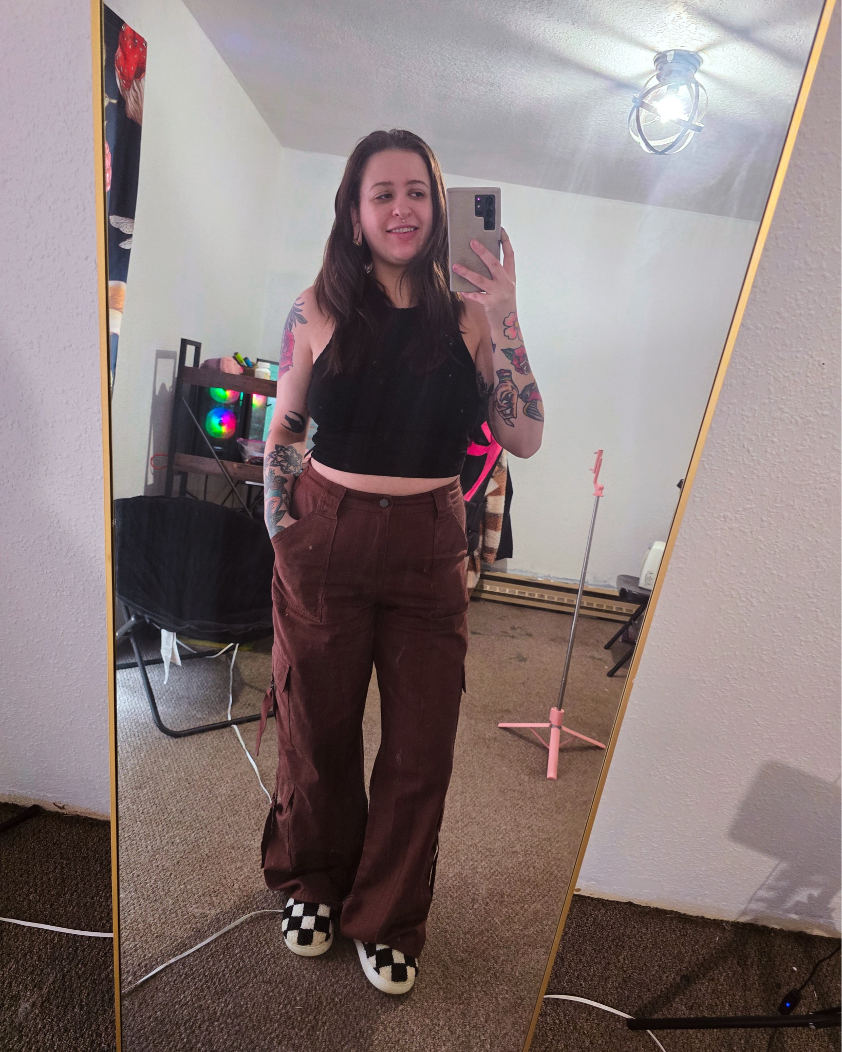 ❤️‍🔥Your belly does not ruin your outfit!❤️‍🔥 Showing the side profile of this casual cozy fit to normalize having a belly! 

Black high neck crop top
Women’s brown cargo pants
Checkered slippers 

#LTKFindsUnder50 #LTKSeasonal #LTKStyleTip