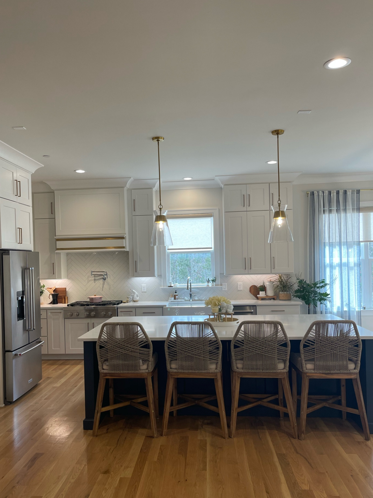 Kitchen styling design for a neutral aesthetic, modern farmhouse style home. Rope counter stools add beautiful texture to the space. 

#LTKhome #LTKstyletip #LTKSeasonal