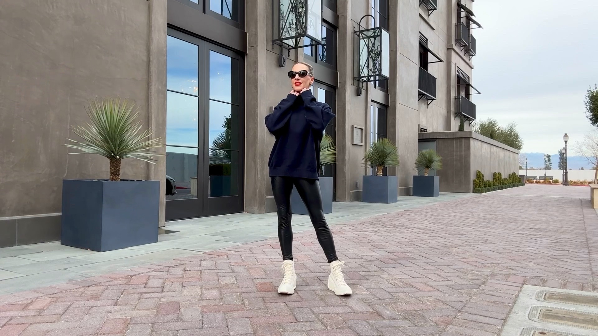 Commando leggings Labor Day sale. Faux leather black leggings are perfect for casual Fall outfits and these are on sale for under $100. Also linking the navy roll neck sweater as turtleneck sweaters are a major Fall Winter trend and white Converse wedges. 

#LTKVideo #LTKFindsUnder100 #LTKSaleAlert