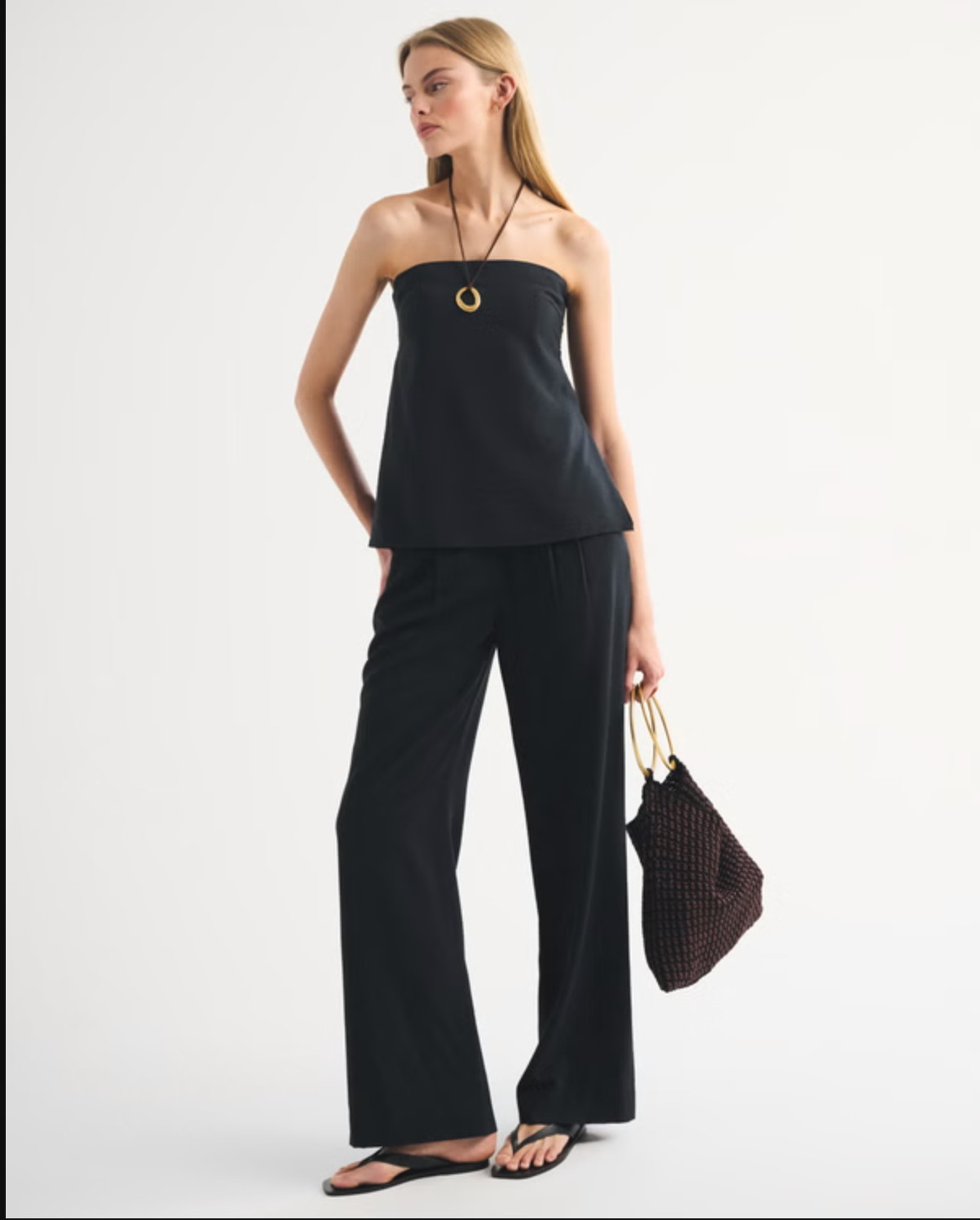 Effortless and a little elevated 🤍 The Abercrombie Strapless Open-Back Set Top is such a chic warm-weather piece. I love the textured crepe fabric, longer length, and the open-back tie detail — it’s equal parts easy and statement-making. Perfect styled with the matching set or your favorite bottoms for a put-together look ✨ 

 #LTKFestival #LTKdayinmylife #LTKgrwm