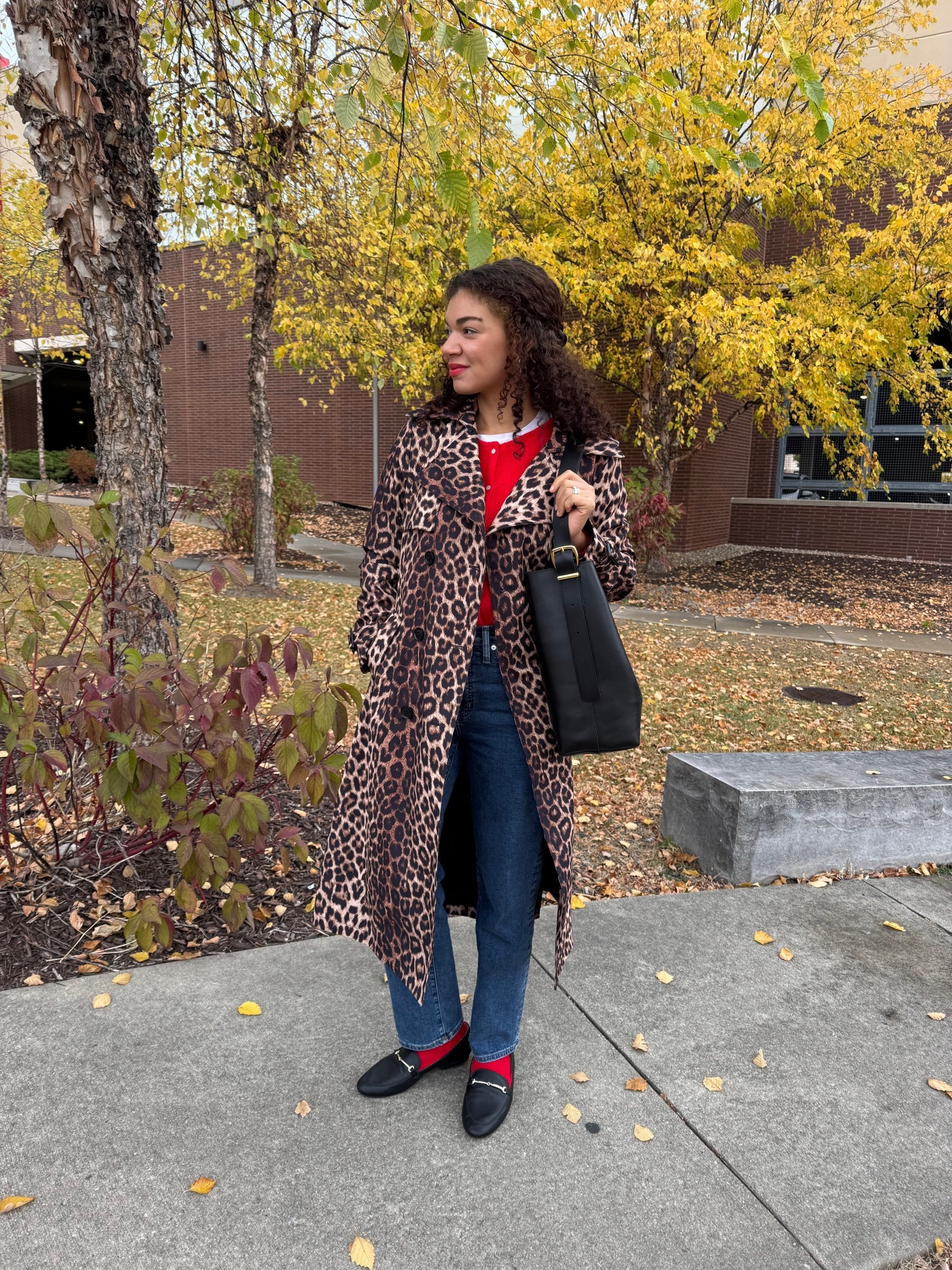 Style red and leopard print together with a leopard print trench coat, red cardigan, jeans, red socks, loafers, and a tote bag 

#LTKSeasonal #LTKStyleTip