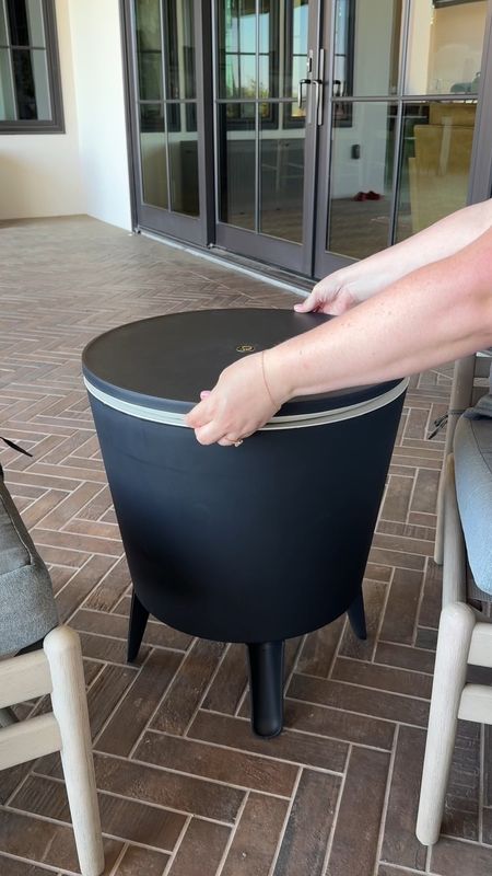
It may not look like it, but this side table is more than just a table. It’s a cooler that can hold up to 42 cans. I love that I no longer have to deal with big, bulky coolers that always seem to get in the way. Now, I have this cooler that seamlessly goes with the rest of my patio furniture. 

I can keep the top up and still use the table portion so guests can grab a drink without continually moving things around, and if you know, you know.

Or you can shop by clicking the link in our profile and then tapping “shop our instagram feed”

#LTKsalealert #LTKhome #LTKfamily