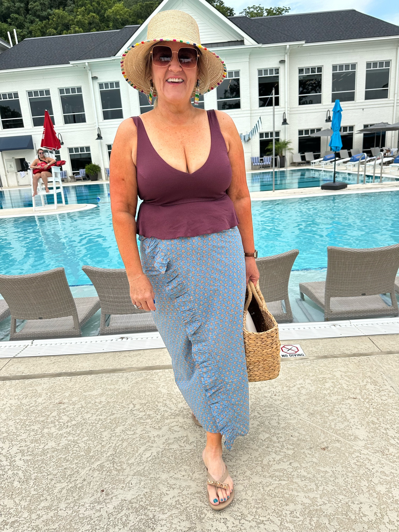 Wearing the spanx flinch too and bottom. I am 5 foot three and the top covers my tummy. If you’re taller, it may not cover your middle, but there is another top that is longer. I love this length for me.
You do have to size up in the top. I’m in a one 1X. The bottom is an XL 10% off spanx code NANETTEXSPANX 

SARANG HAS A REALLY PRETTY RUFFLE TRIM, AND THE HAT IS SO WELL-MADE. YOU CAN GET IT WET. IT’S DARLING. I LOVE IT. 
DON’T MISS SUNSHINE JEWELRY TOO. IT IS THE CUTEST PIECES. 