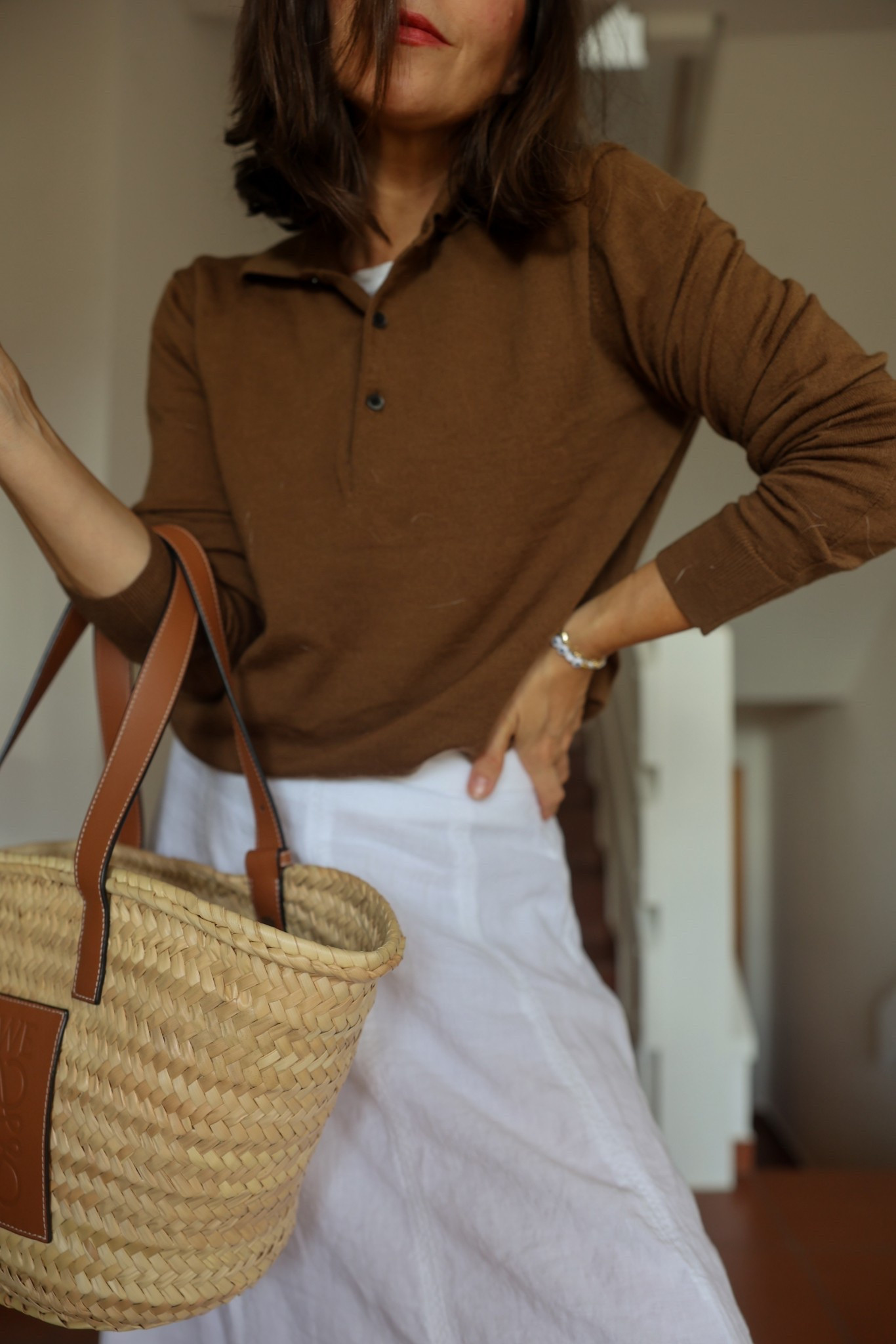 Summer to Fall transition. 

Wearing my white linen skirt with a white tee and brown polo Merino wool sweater to slowly transition into Fall.

Sweater: Uniqlo (bought it secondhand at Goodwill back in LA - still with the tag on)
White A-Line Linen skirt: Marc O’Polo ordered at Zalando Austria) 
Basket bag: Loewe

#LTKstyletip #LTKautumn #LTKeurope