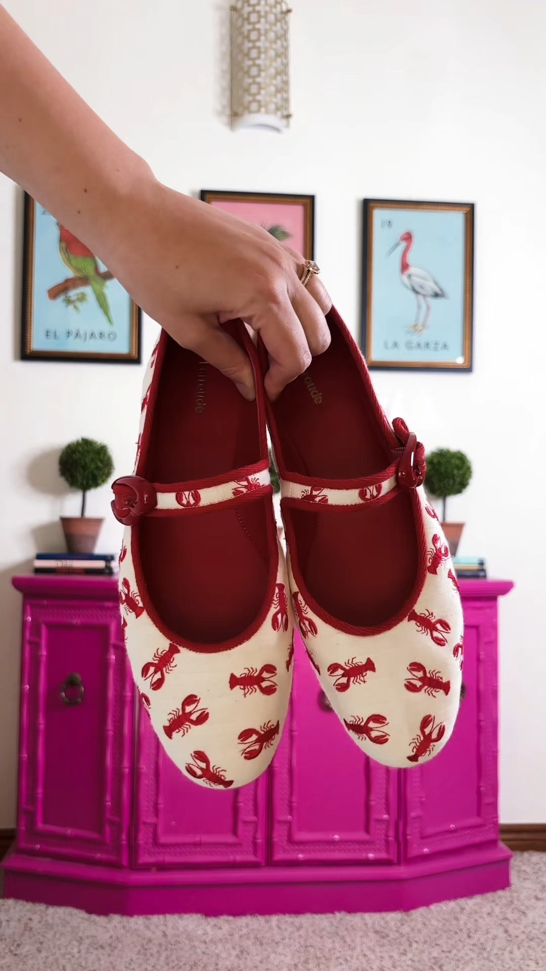 Look 18 - Coastline Calling Capsule
Classic. Not boring. 🦞

An everyday outfit - but the subtle color blocking, red accents, and “lobster blocking” (yes, they’re on the shoes and the earrings) make it anything but dull. It’s straightforward and super wearable, but every piece has personality.

Part of Coastline Calling, my maximalist summer capsule designed for bold, coastal-inspired looks that still work in everyday life. This one’s ready for errands, brunch, museum dates, or wherever the day takes you—lobsters in tow.

Shoes - Larroude (linked)
Shirt - Katie Kime (linked)
Pants - Anthropologie (current colors linked)
Earrings - Target (linked)
Bracelet - Rocksbox
Headband - TJ Maxx (similar linked)
Bag - Vintage (similar linked)
Fragrance - Dolce & Gabbana (linked)

#larroudemyway #katiekime #anthropologiestyle
#CoastlineCalling #WearableStatement #LobsterStyle #SubtleColorblocking #SummerCapsuleWardrobe #StyledMyCloset #StatementFlats #MaximalistFashion #OutfitDetailsMatter #CoastalCool #PreppyStyle #CherryRedVibes #RetroSummerStyle #CapsuleWardrobeChallenge #ColorfulStyle #EverydayOutfits #FashionWithFun #LTKStyle #OOTDVideo

#LTKSeasonal #LTKShoeCrush #LTKSaleAlert