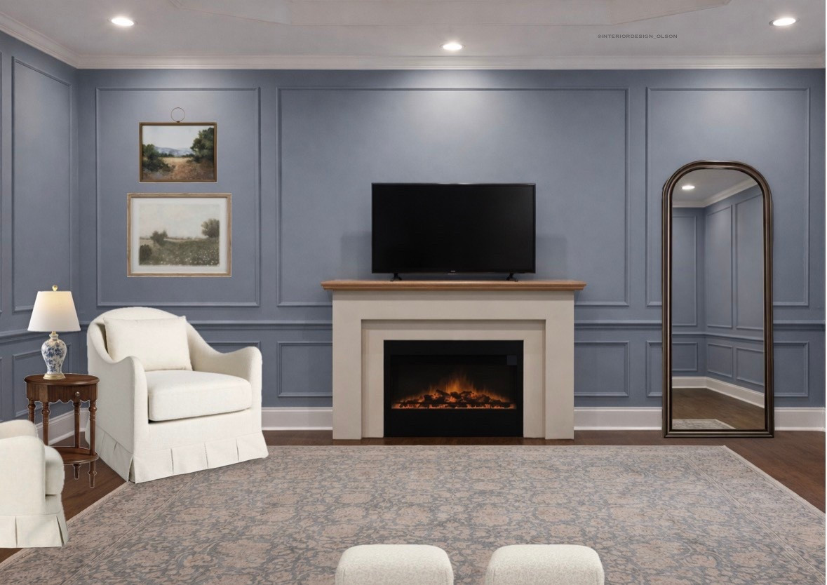 Turning a bedroom into a retreat is all about the details 
Adding a sitting area and fireplace instantly elevates the space and makes it feel warm, cozy, and complete. The slipcovered chairs keep it relaxed and livable, while the layered textures, classic finishes, and soft blue walls bring in that traditional charm.

This space was designed to feel peaceful, functional, and timeless perfect for slow mornings, quiet evenings, and everyday comfort.

Shop the chairs, mirror, rug, lighting, and fireplace decor below.