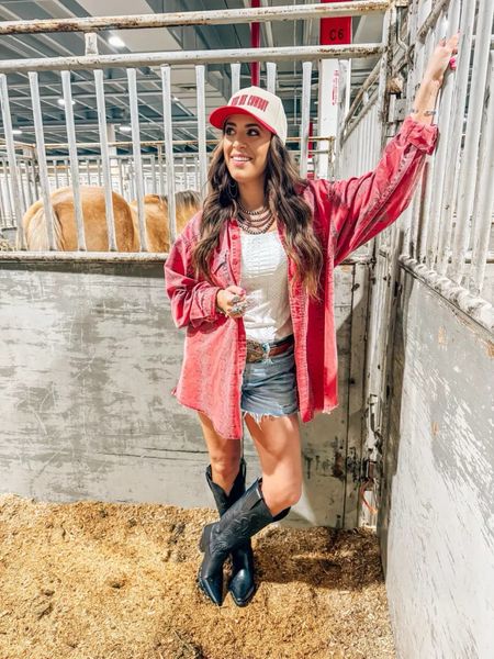 Cute Western outfit idea or rodeo outfit ideas with this cute - trucker hat, tall black cowboy boots, agolde cut off denim shorts, and a red shacket. 
5/21

#LTKSeasonal #LTKFestival #LTKStyleTip