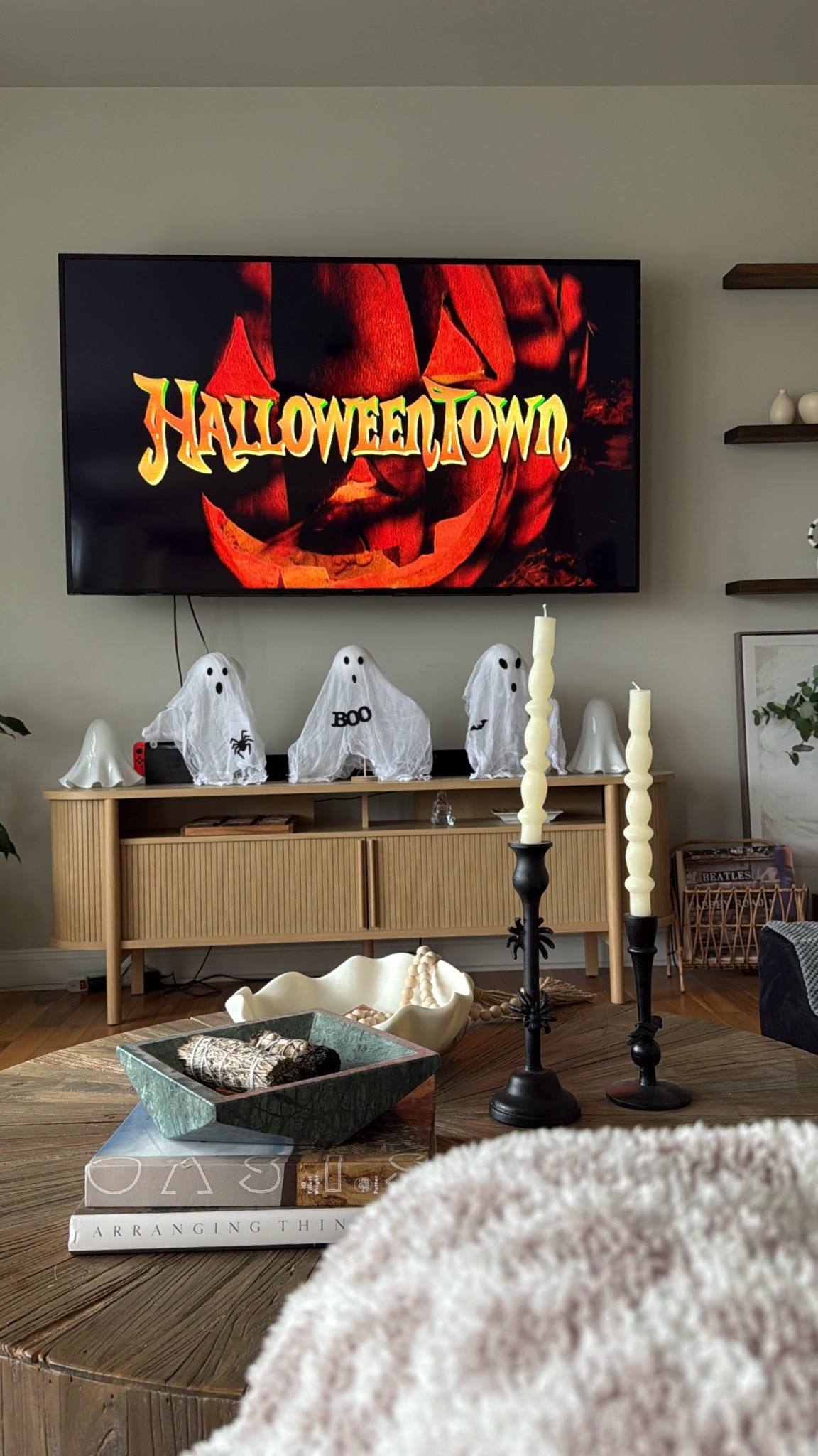 Spooky season vibes 🕯️👻 Movie night with Halloweentown + the cutest ghost decor. Linking my ghosties, wavy candles & cozy throws for your perfect October night in 🎃✨ 

#LTKhome #HalloweenDecor #LTKseasonal #MovieNightIn #LTKholiday

#LTKHalloween #LTKSeasonal #LTKHome