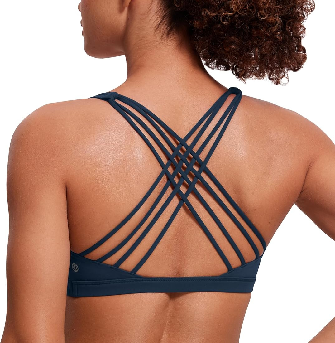 CRZ YOGA Strappy Sports Bras for Women - Criss Cross Back Sexy Wireless Padded Yoga Bra Cute Work... | Amazon (US)
