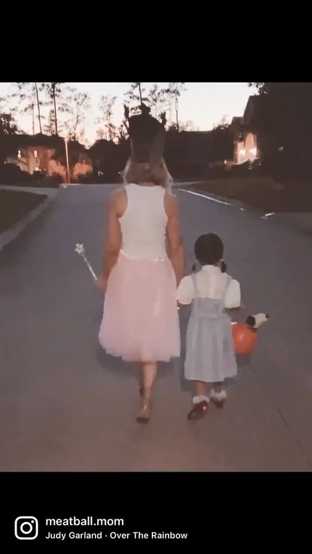 When my daughter was Dorothy for Halloween she wanted me to wear a costume to match her. 

I wore a white tank top I already had - as well as my wedding heels.  I purchased a silver witch crown, a pink skirt and a wand from Amazon so I could have a DIY Glinda the Good Witch costume. 

It was great!  If you live in cooler weather I linked a white sweater you could pair with the skirt.  Without the crown this would even double as a pretty holiday outfit! 





halloween costume , halloween costume ideas , family costume idea , wizard of oz costume idea #ltkseasonal #ltkstyletip #ltkshoecrush #ltkunder50 , halloween 

#LTKfamily #LTKHalloween #LTKSeasonal