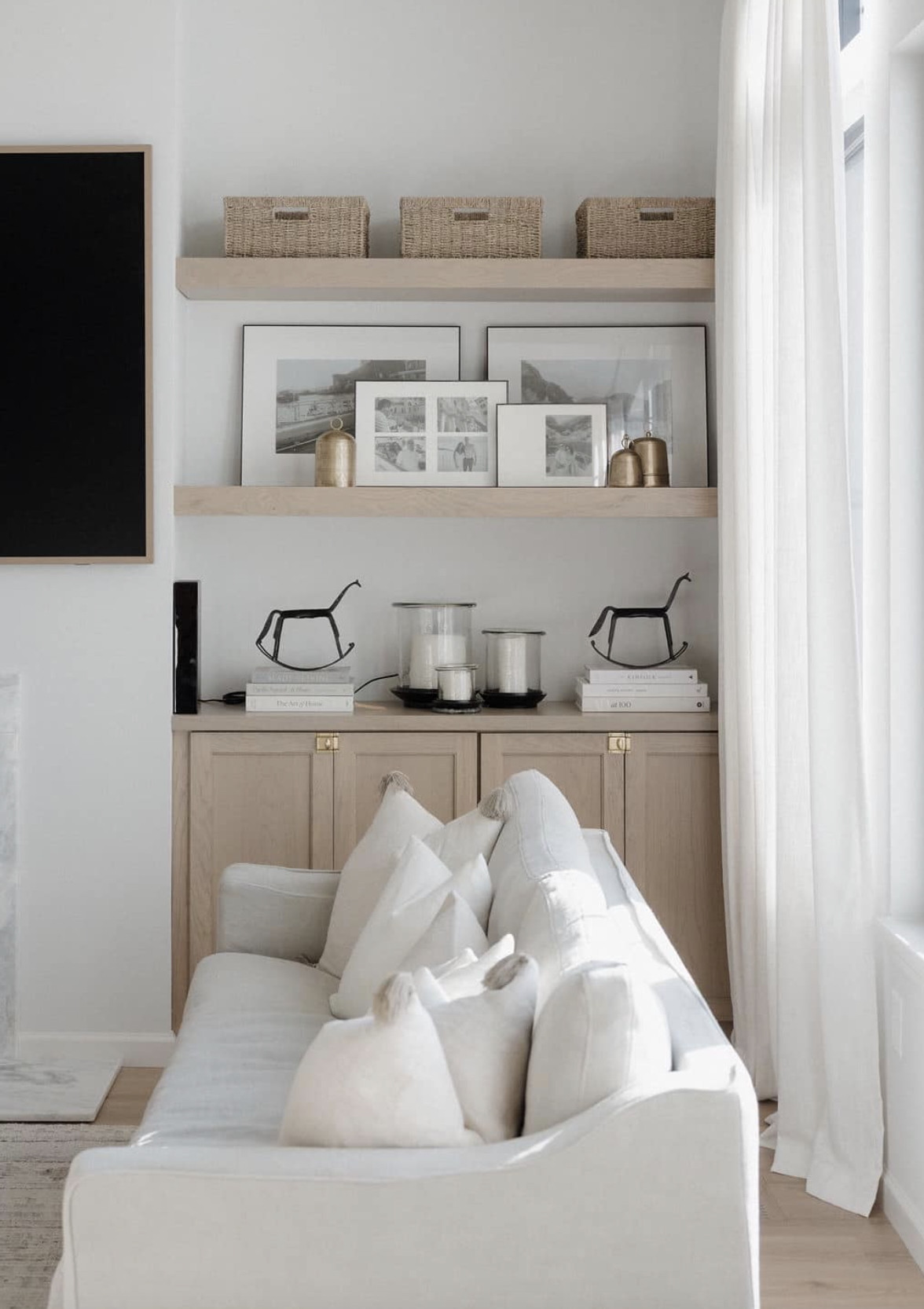 Shop everything in our living room! // Wall color: First Star by Sherwin Williams // Flooring: Coretec LVP in Springfield Oak // Cabinets: Custom by Countryside Cabinets in North Pier 

 #LTKHome