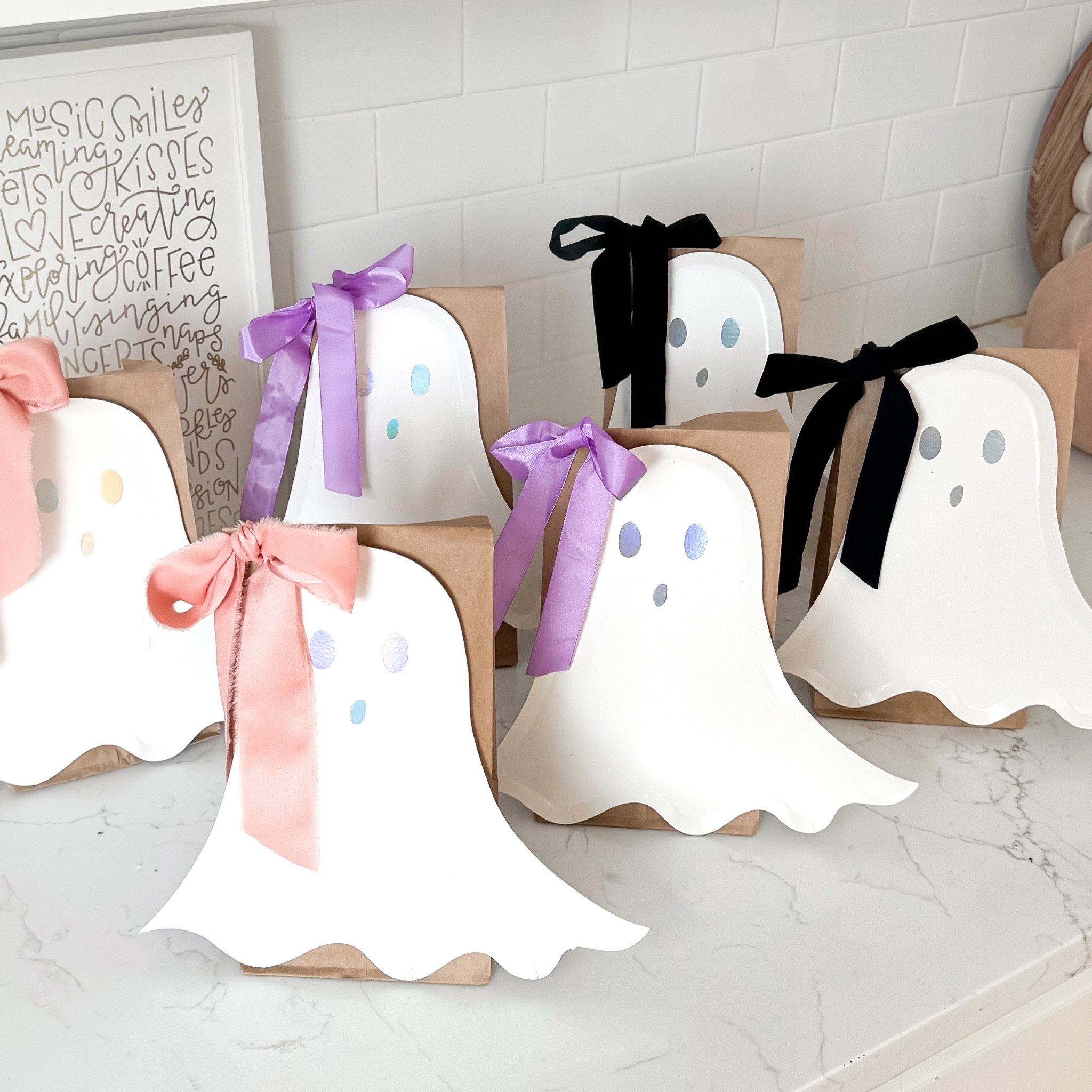 DIY bow wearing ghost party favor bags by STEPH @mama.jots 

#LTKkids #LTKparties #LTKSeasonal