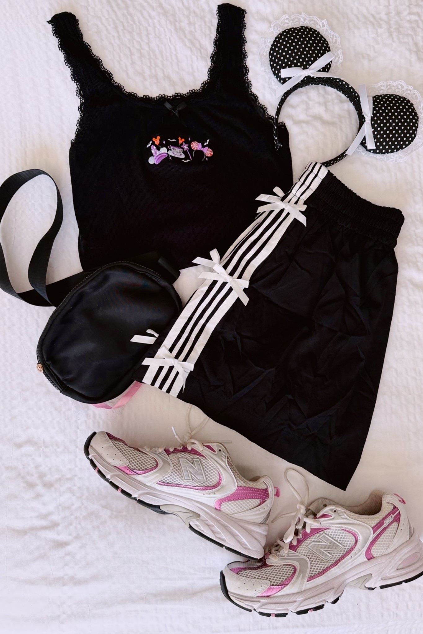Outfit for Mickeys not so Scary Halloween party at Walt Disney World
- lace trim tank with Mickey ear fall design
- Women’s athletic shorts with bows 
- pink new balance sneaker
- lace trim polka dot Minnie ears 
Disney | Halloween | vacation | Orlando | outfit inspo | boo to you | hocus pocus

#LTKootd #LTKOver40 #LTKTravel