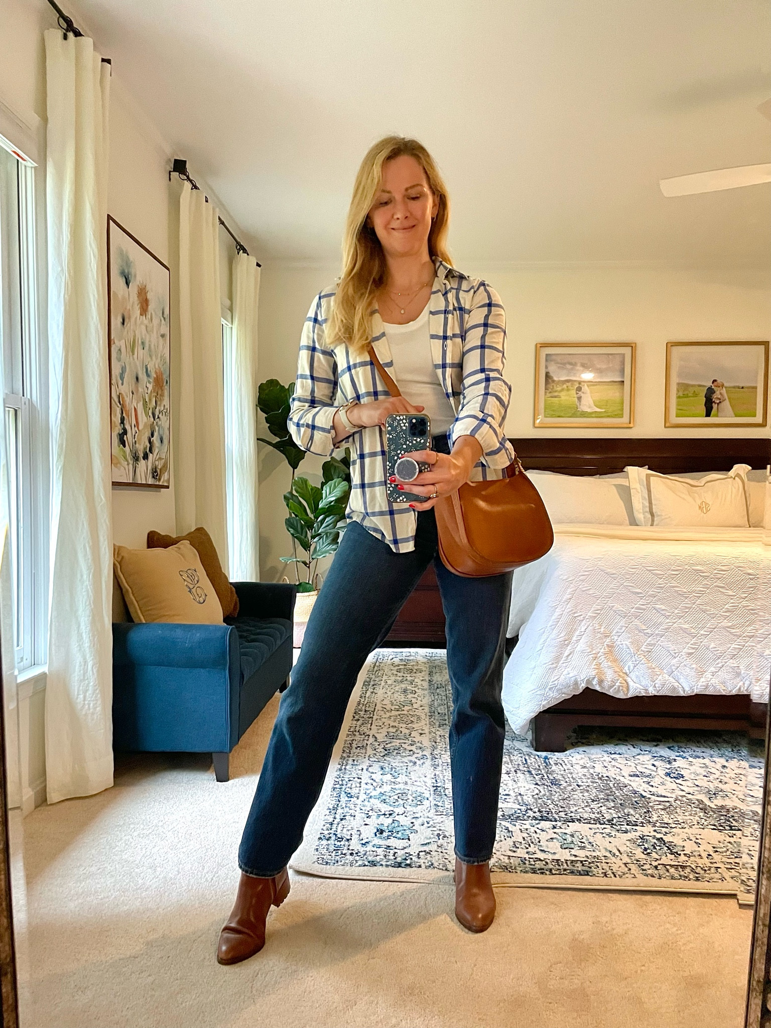 Fall outfit idea - What I wore to the Apple orchard last weekend

White and blue plaid flannel is old but I found a nearly identical one that’s 20% off rn!

90s style straight leg jeans have the best fit and come in tons of washes. I get my normal size 

Basic scoop neck tank is an affordable style essential

Brown leather bag is another year round staple for me that has stood the test of time/mom life. Currently 25% off

Brown leather boots fit true to size and are also 25% off!

Fall fashion staples

#LTKfindsunder100 #LTKsalealert #LTKSeasonal