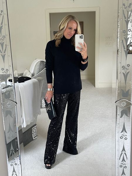 Cozy, chic, holiday, party look
Cozy Christmas party outfit 

Black, cashmere turtleneck, black sequin pants, YSL tribute sandals  

#LTKSeasonal #LTKHoliday #LTKstyletip