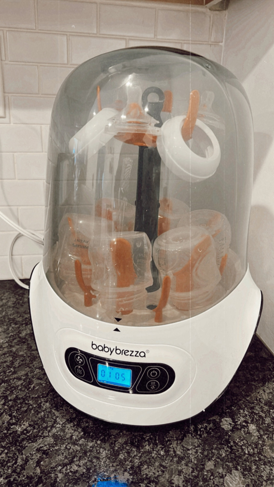 This thing is the absolute best! It makes sterilizing and drying bottles so easy. 

#LTKbump #LTKbaby #LTKhome