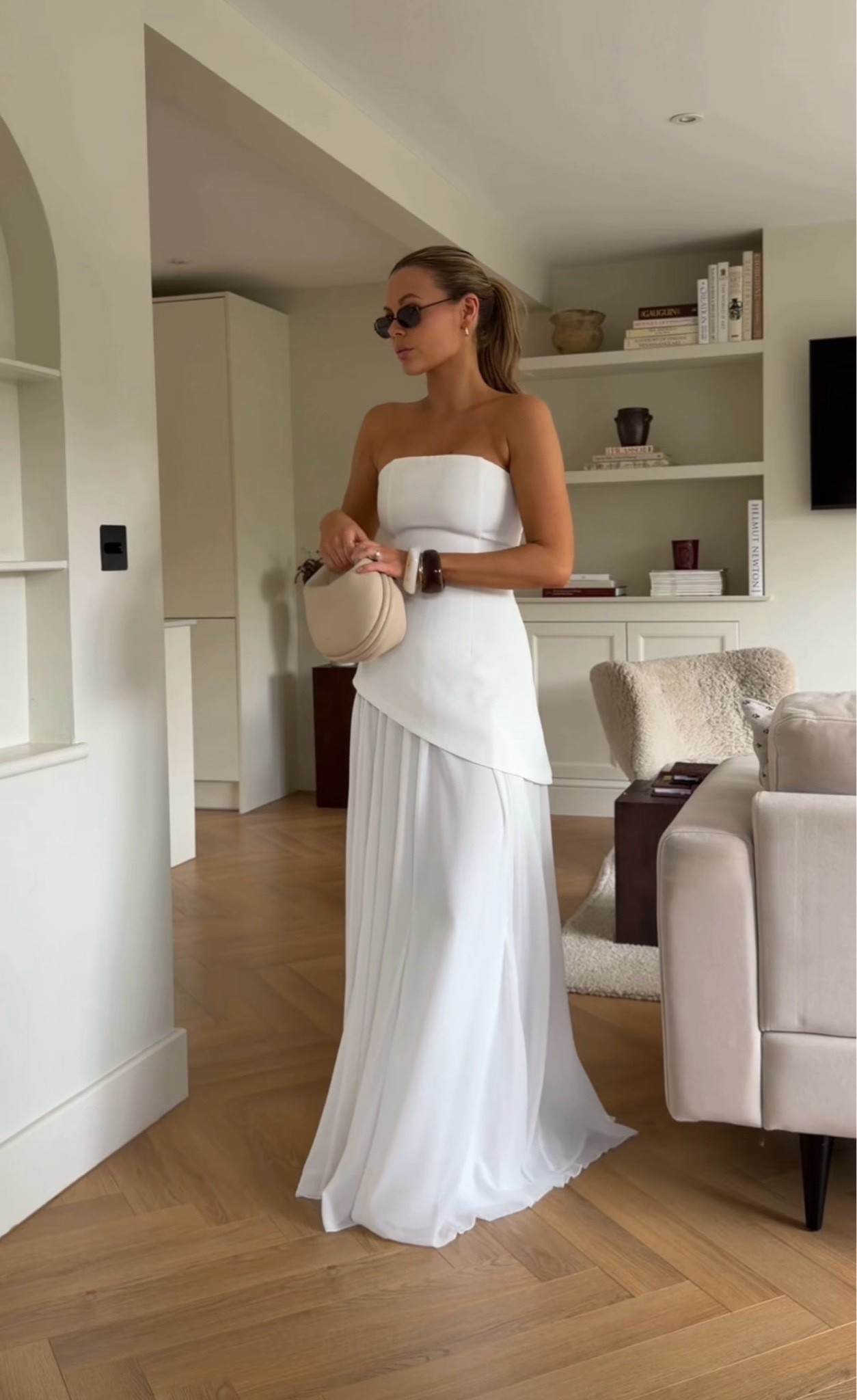 4th & Reckless strapless white maxi dress, ivory occasion dress, bandeau neckline, structured bodice, asymmetric overlay detail, layered design, pleated skirt, flowing maxi silhouette, floor-length dress, elegant white dress, minimalist fashion, modern bridal style, timeless sophistication, clean lines, feminine silhouette, luxury-inspired design, quiet luxury aesthetic, old money style, European summer fashion, resort wear, destination wedding guest dress, engagement party outfit, bridal shower dress, rehearsal dinner dress, formal event dress, chic occasion wear, effortless elegance, contemporary classic, refined tailoring, elevated basics, monochrome styling, understated glamour, sophisticated evening look

I am wearing a size uk 8 and I’m 5.4 and a standard size 8

#LTKspring #LTKsummer #LTKwedding