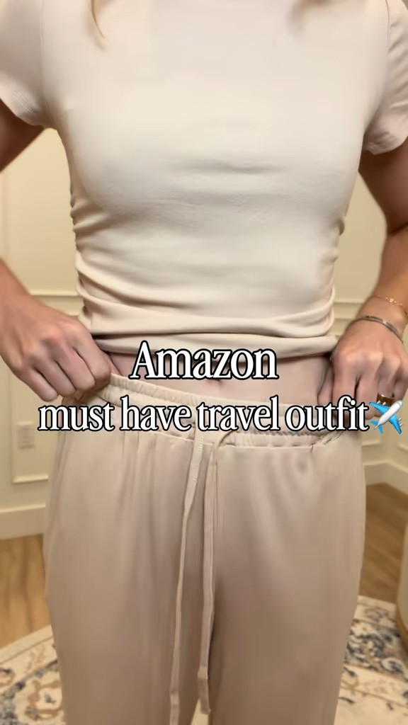 Amazon must-have travel outfit ✈️ This matching top and drawstring pants set is so soft and comfy for long flights, but still looks put together.

True to size. Linked below!

#LTKTravel #LTKootd #LTKSeasonal