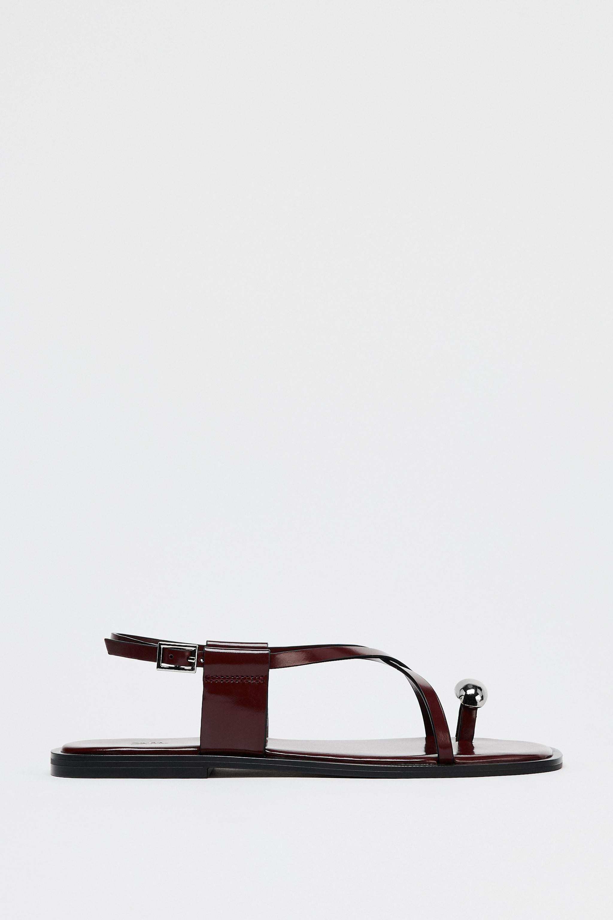 FLAT STRAPPY SANDALS WITH METAL EMBELLISHMENT | Zara US