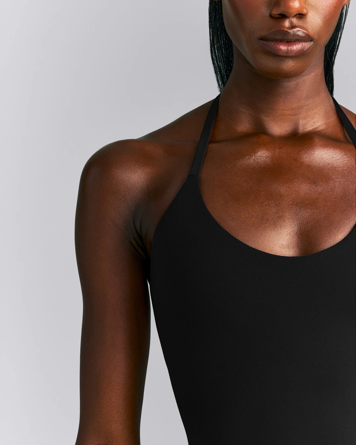 SoftMotion\u2122 Strappy Halter Neck Tank Top with Built in Bra Shelf New Branding
Black | Oner Active (UK / US)