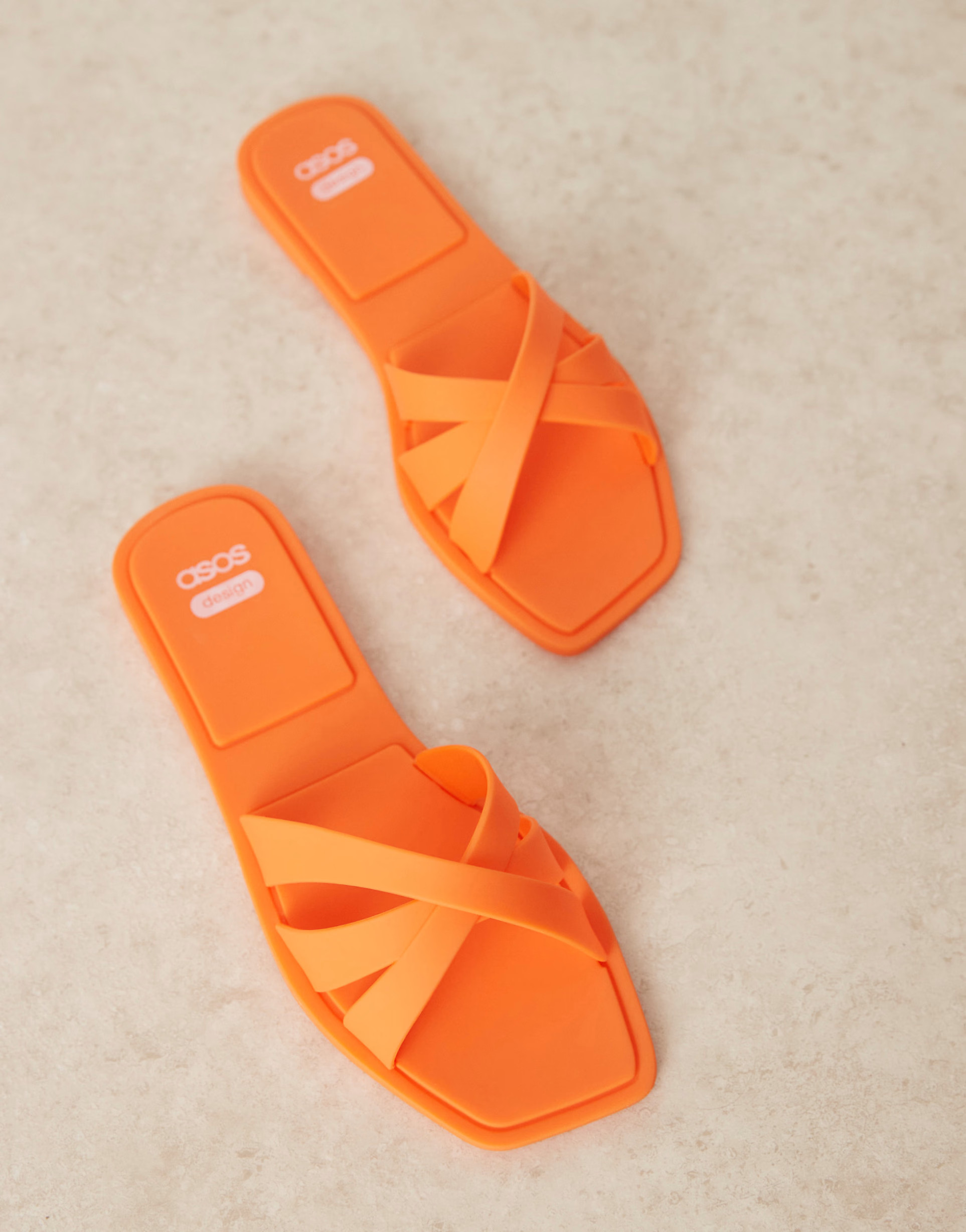 ASOS DESIGN Fia cross strap jelly flat mules in orange | ASOS (Global)