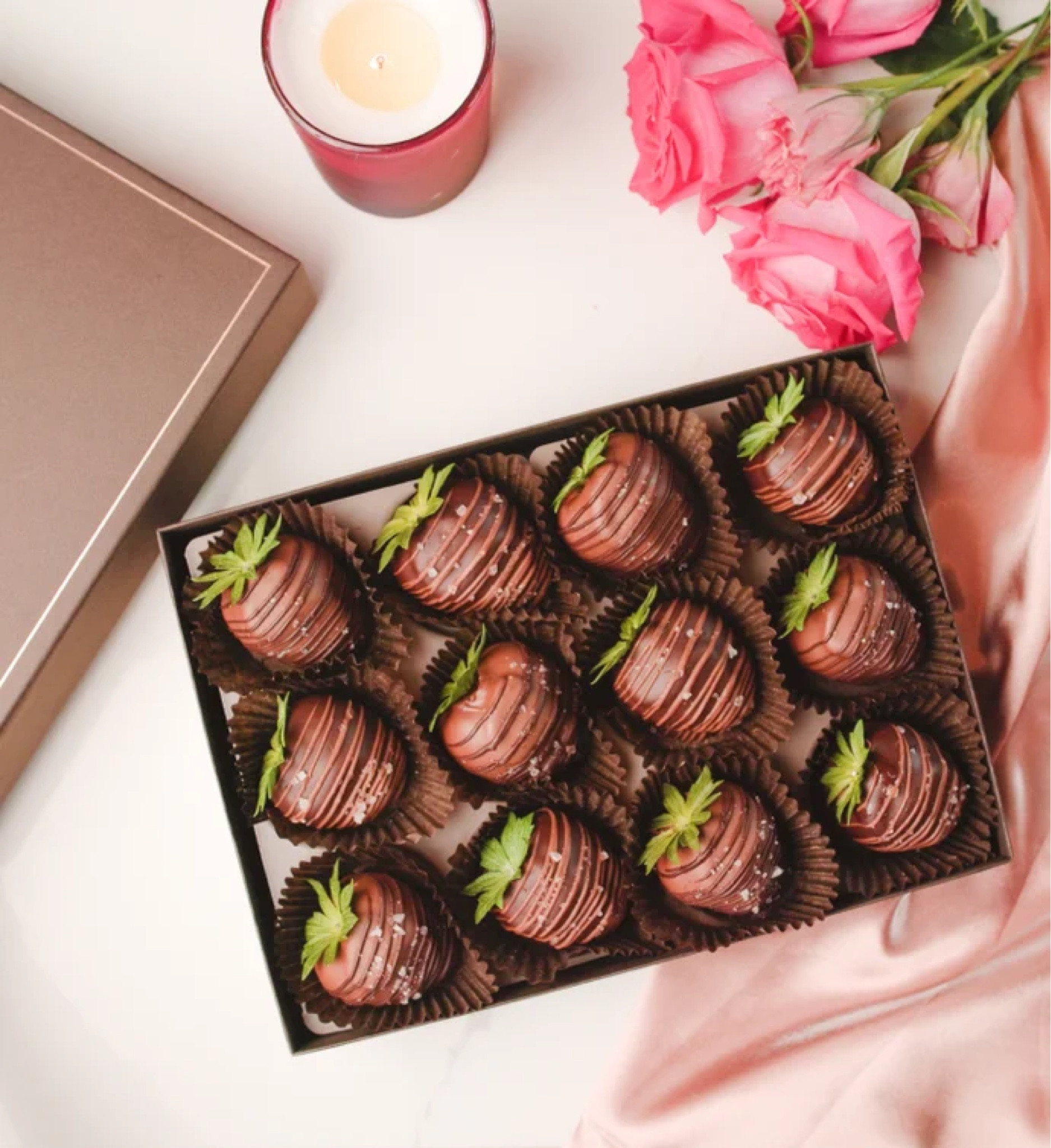 Plump, perfectly ripe strawberries are hand-dipped in creamy Belgian milk chocolate with Belgian dark chocolate drizzle or rich Belgian dark chocolate with Belgian milk chocolate drizzle. Topped with caramel and sprinkled with a hint of sea salt, it’s a flavor combination that delights the taste buds with luscious, sweet goodness.