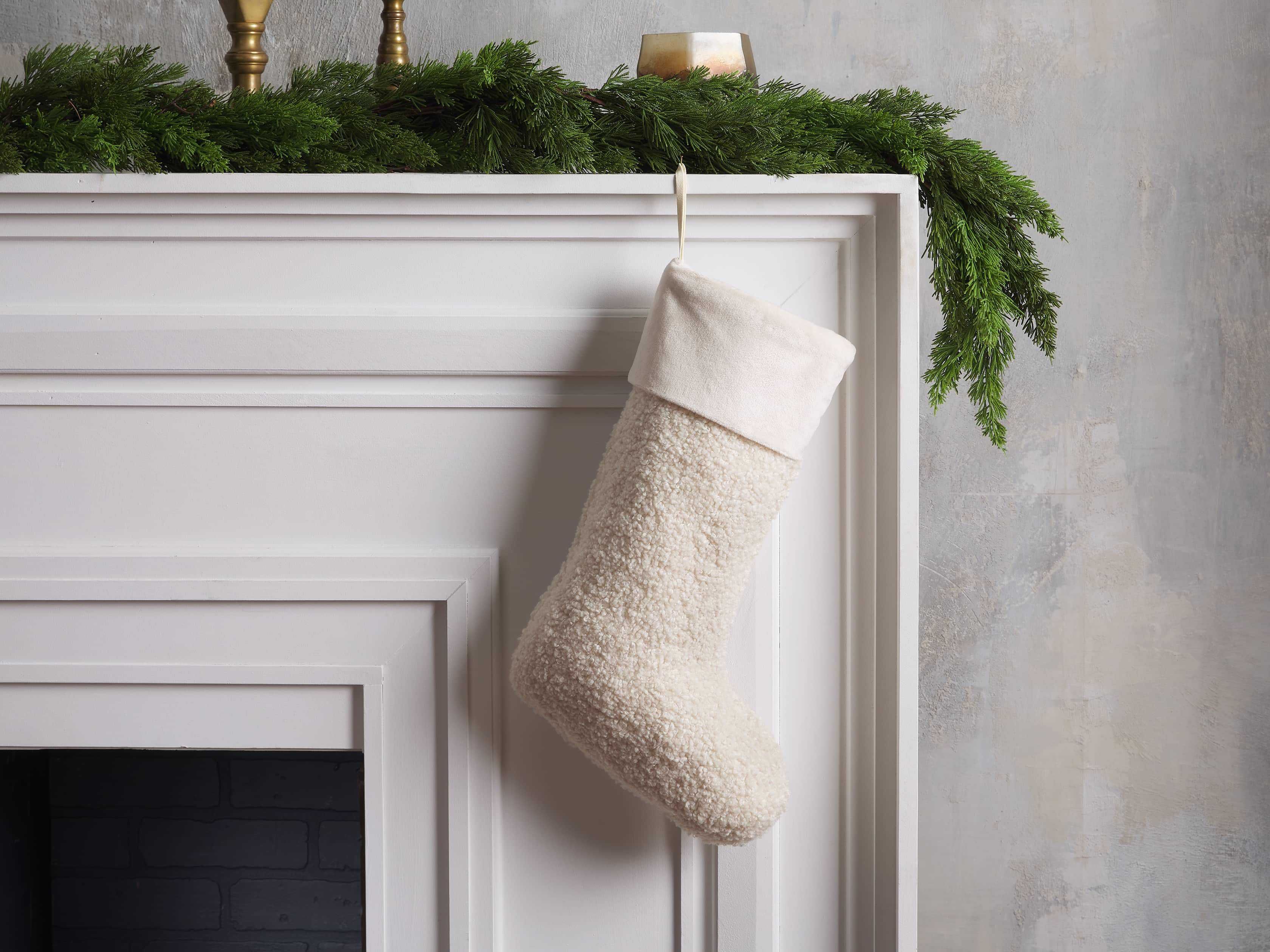 Crafted to accent holiday décor with soft texture, our Faux Sherpa Stocking is woven from 100% p... | Arhaus
