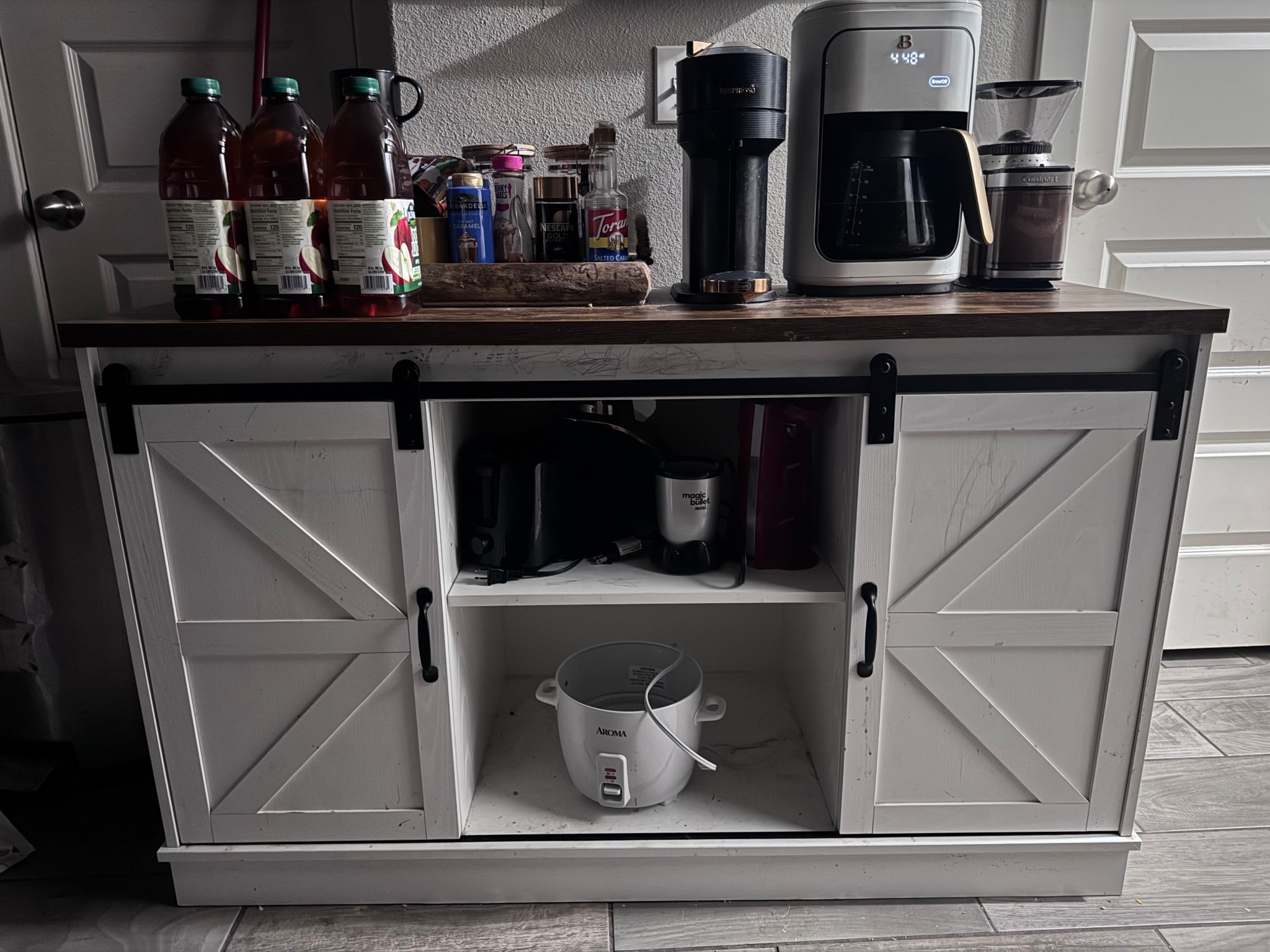 Every morning I look forward to my beautiful coffee bar. It’s my happy place. I love how it has an outlet on the side so I can very easily plug all my appliances into it. 