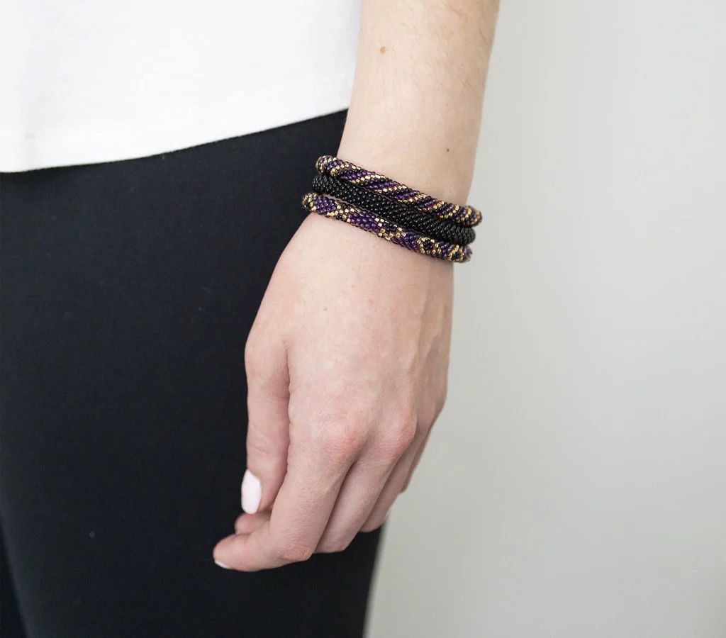 Game Day Roll-On® Bracelets  Purple and Black | Aid Through Trade