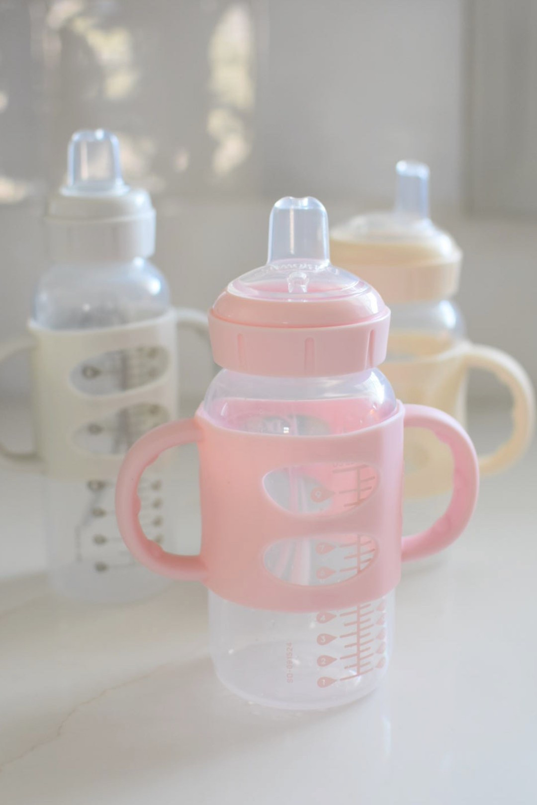 When my baby turned 1 we transitioned from formula to whole milk while also switching to a sippy bottle. This style from Dr Browns has less parts to wash than other brands, and the removable silicon handles make it so easy for her to drink on her own. Dishwasher safe!

#LTKBaby #LTKKids #LTKBump