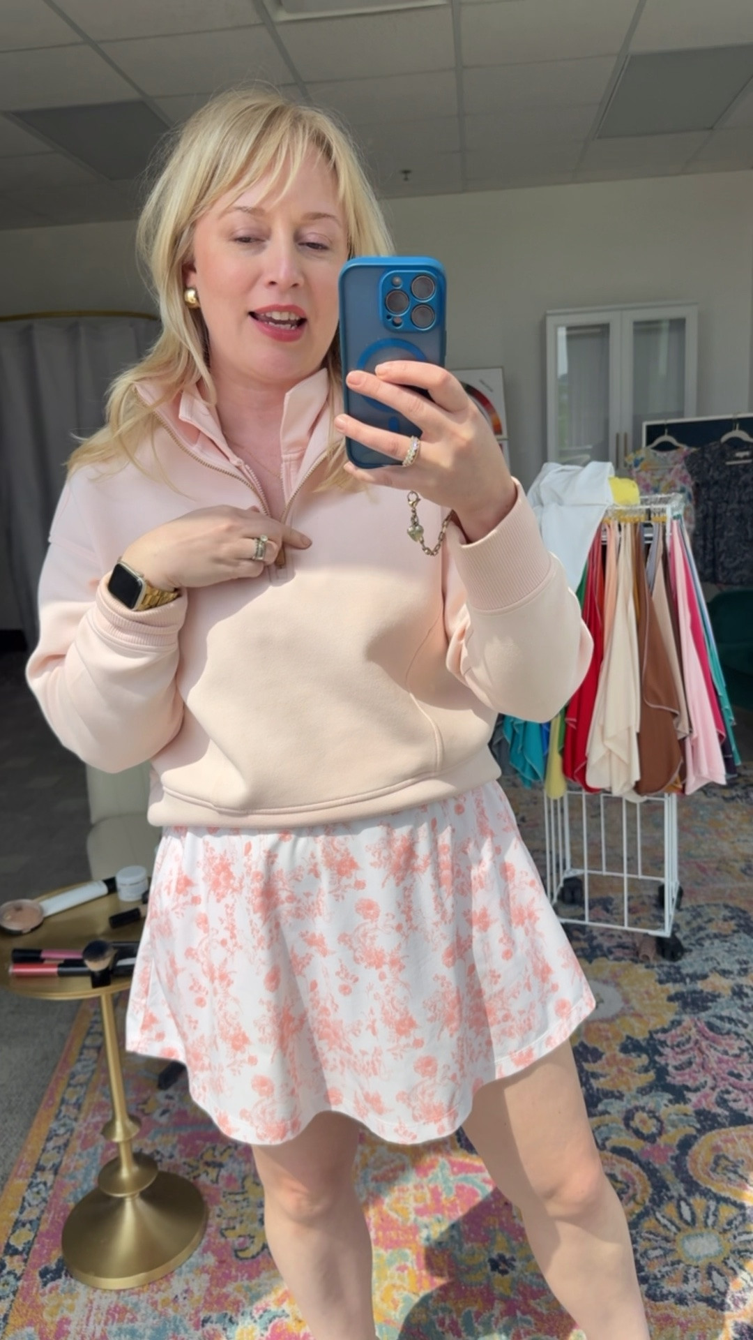 A sporty casual look. This quarter zips runs a bit big. Sized down to a small. Skort is old.
