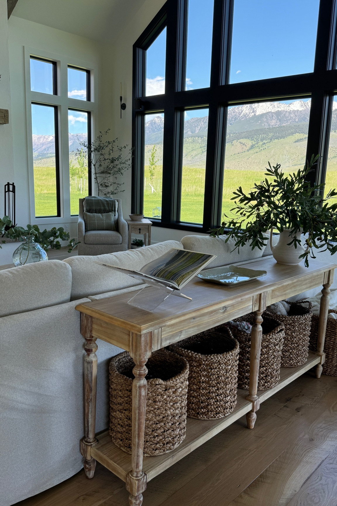Living room views 🤍🤍🪴

Console table, storage baskets, Yellowstone book, coffee table book, unique home decor, pottery, vase with olive stems, coffee table, book display, table display for book, accent table, side table, olive tree, accent chair, vase with stems

#LTKHome