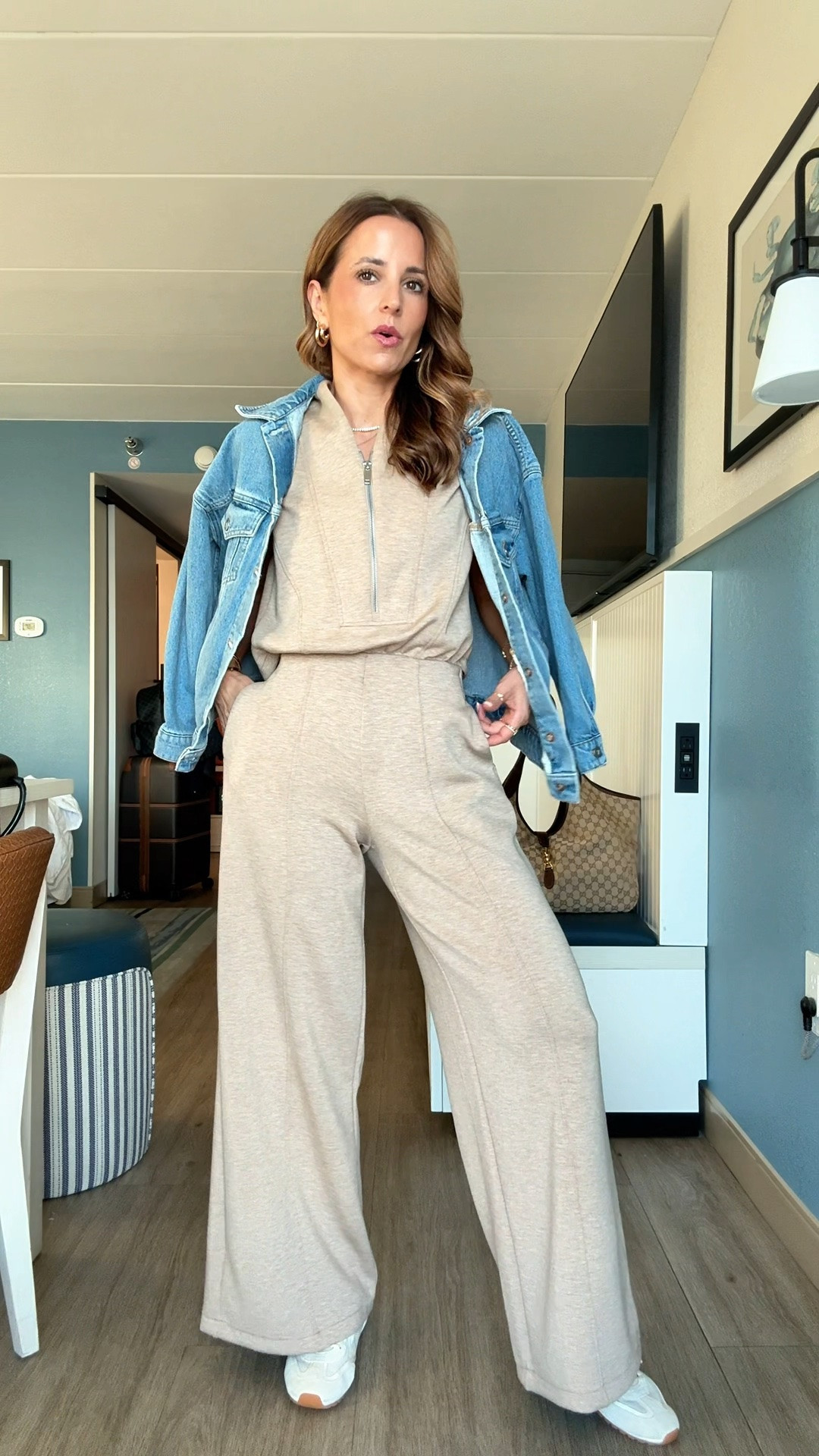 My travel outfit of the day. Spanx jumpsuit in XS petite - size down if in-between sizes. Bathroom-friendly and opens in the back. Code LISAMARIEXSPANX on first time purchases. Boyfriend denim jacket in XXS petite. Tory Burch field sneakers - I went up half size. Airport outfit. Elevated casual.

#LTKootd #LTKTravel #LTKPetite
