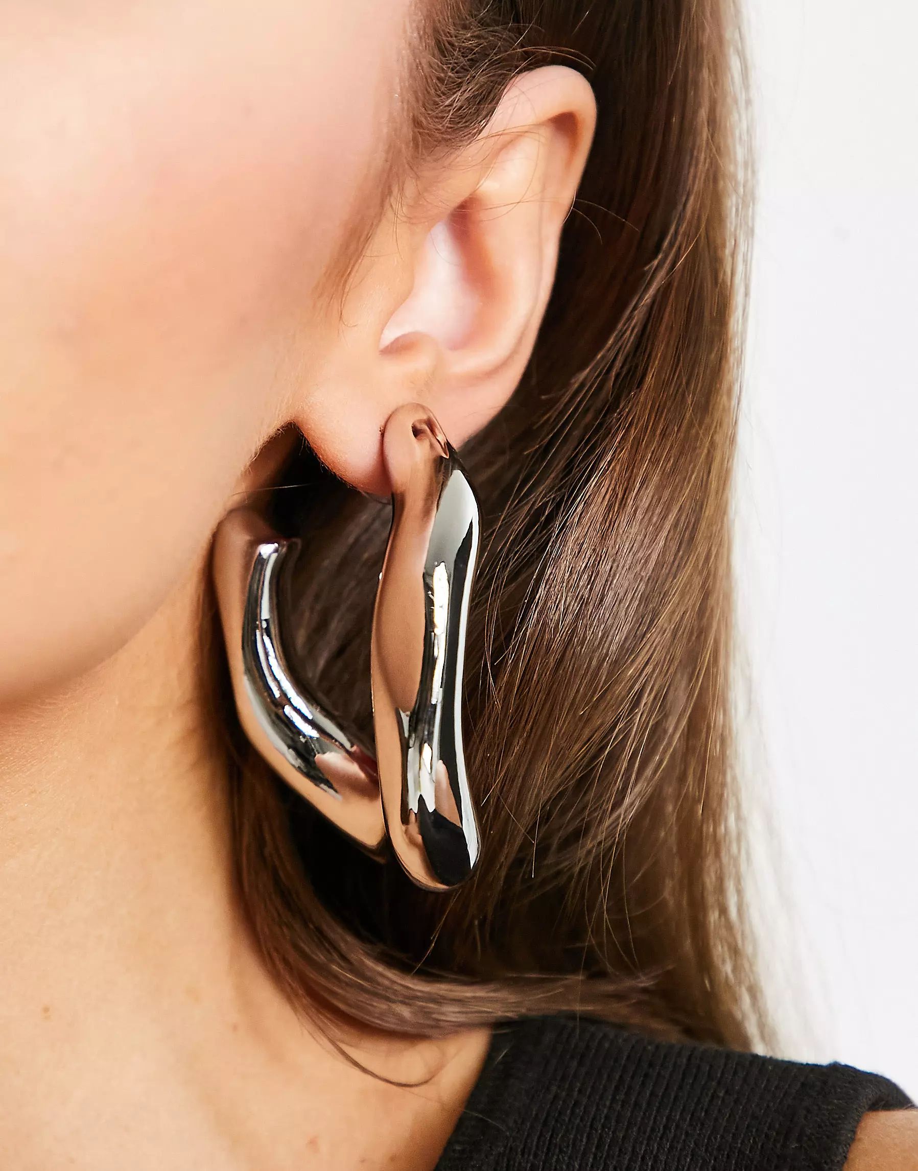 ASOS DESIGN hoop earring with large twist link design in silver tone | ASOS (Global)