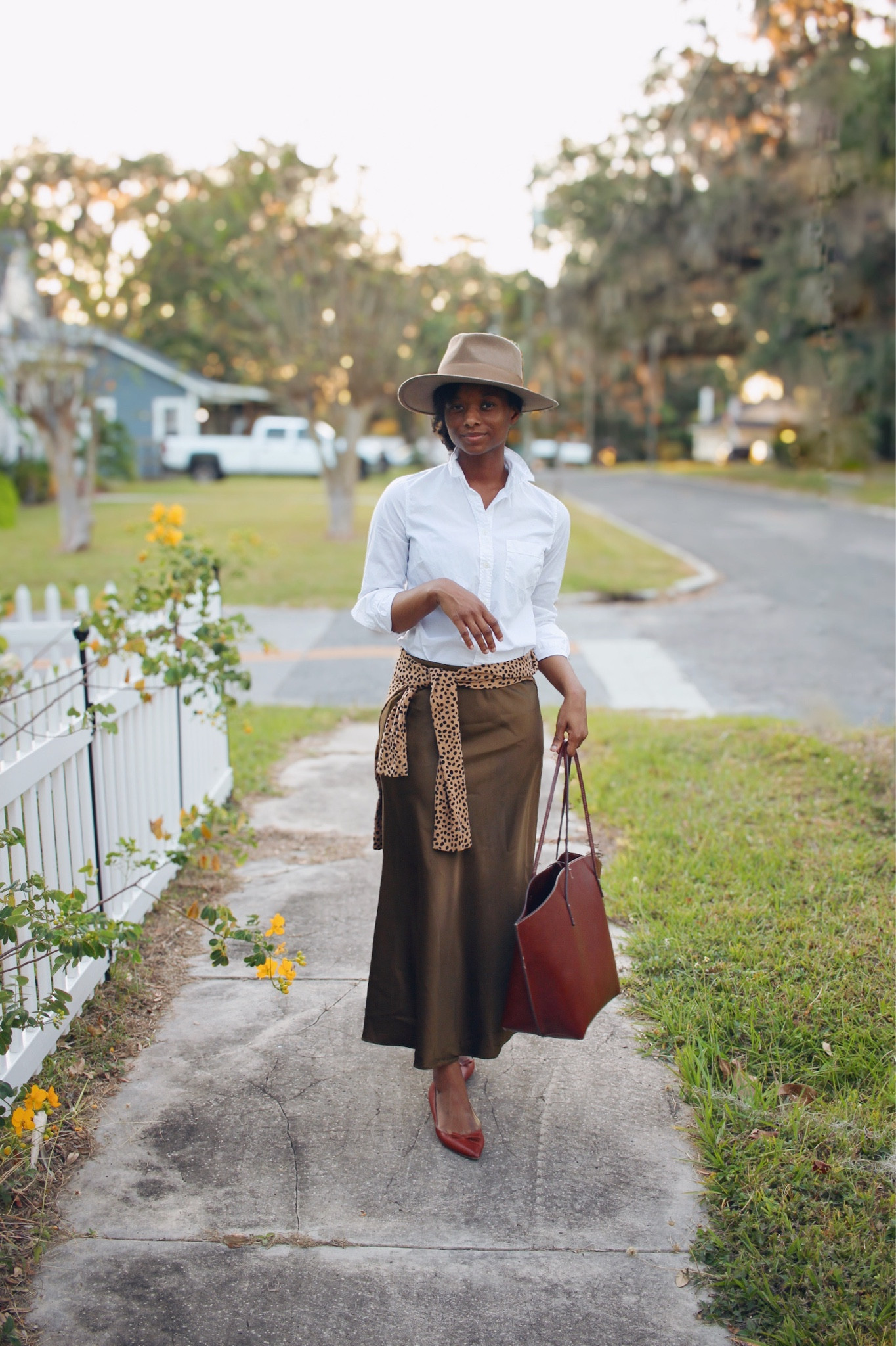 Olive and chocolate brown autumn outfit. Satin skirt under $70 
Classic white shirt under $50 and cotton cheetah sweater on sale 

#LTKSeasonal #LTKsalealert #LTKfindsunder100