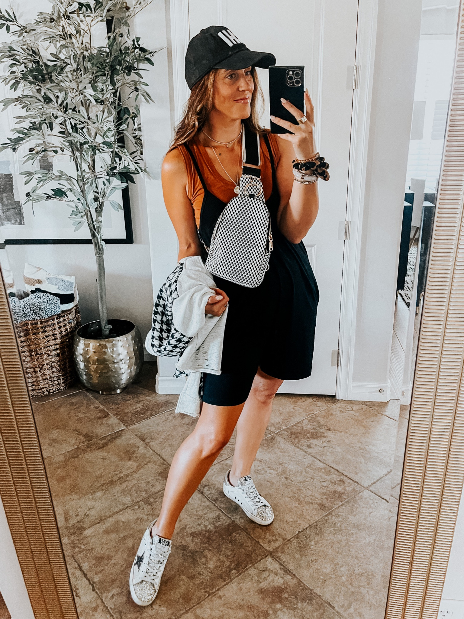 Summer travel outfit // amazon fashion, casual style for Summer // amazon romper (size small) tank on sale (size small) houndstooth shacket, sneakers, sling bag & hat 

#LTKunder50 #LTKFind #LTKtravel