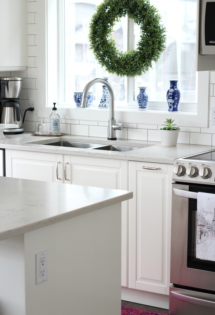 A boxwood wreath is the perfect way to ease into the holiday season with a simple, natural touch. Here I used a command hook to hang it on our kitchen window. I’ve also hung this wreath on our front door with a ribbon bow. It’s very versatile!

#LTKHome #LTKSeasonal #LTKSaleAlert #LTKHoliday