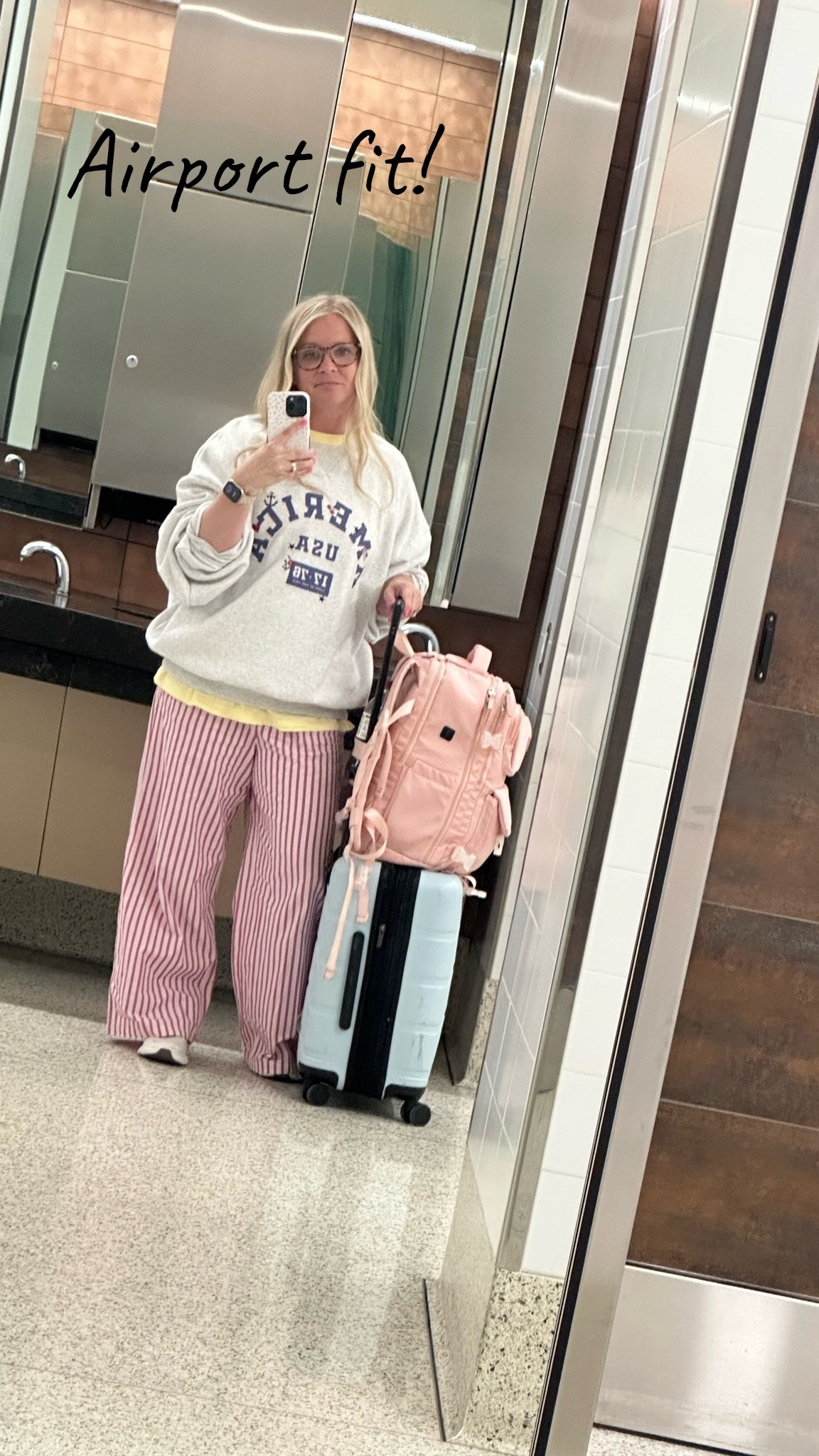 Flying home today, in the most comfy outfit

Pants and oversized tee are size small. 
Size XL in the sweatshirt

#LTKootd #LTKOver40