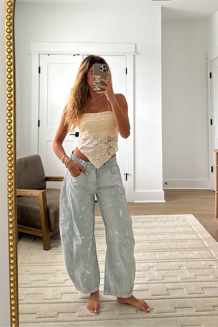 spring outfit of my dreams🤍 love the distressing on these jeans + the lace details of this tube top:) wearing XS top + 24 bottom 

#LTKSeasonal #LTKfindsunder100 #LTKstyletip