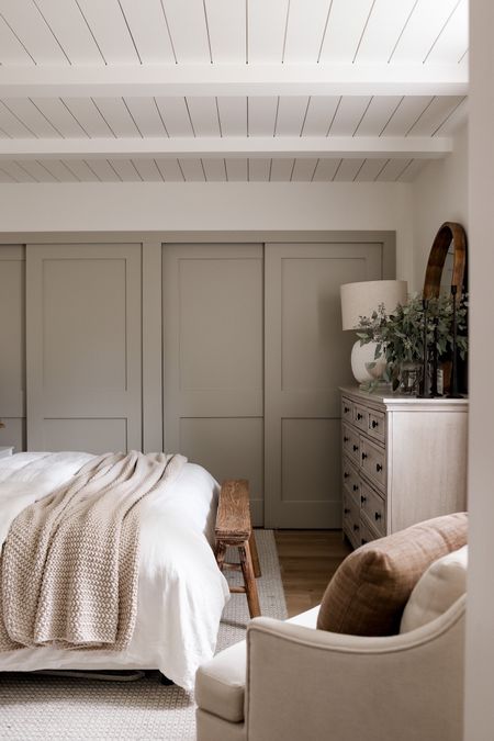 Shop or neutral bedroom including this gorgeous dresser from Wayfair, target chair, upholstered bed, and bedding! Paint colors are Benjamin Moore Swiss coffee and Sherwin Wiliams Jogging Path

#LTKhome #LTKSeasonal #LTKsalealert