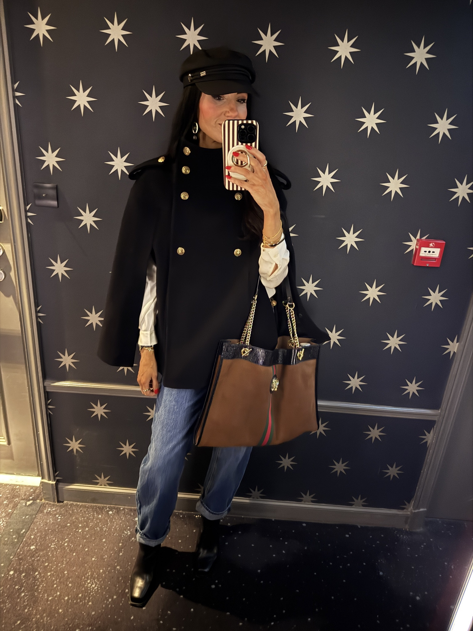 The one pair of jeans I took to Paris were these. My hat is Amazon and the cape was a dream outer layer. This style will continue to trend so don’t miss her before she sells out. 