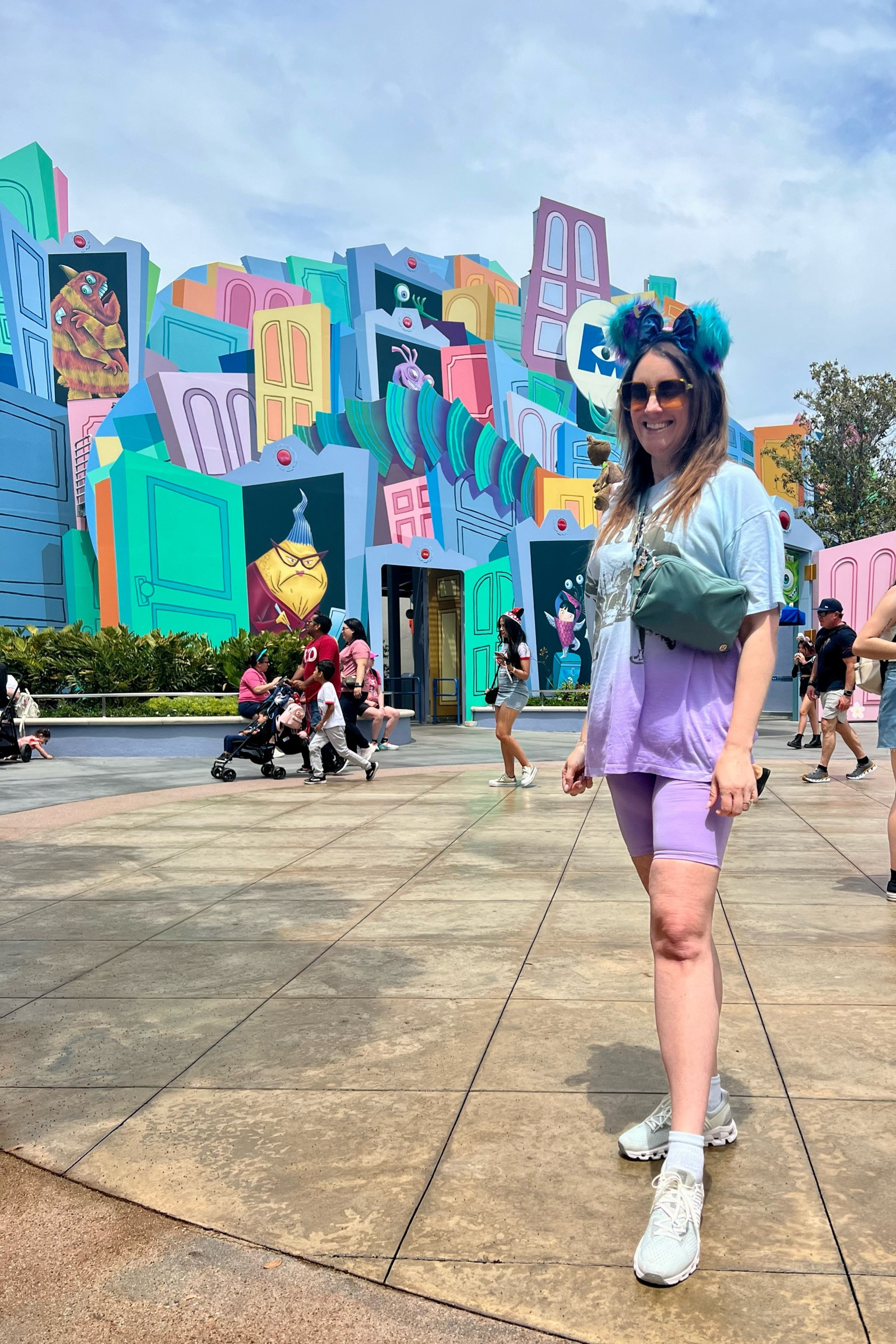 What I wore to Disneyland California Adventure. Day 2 look. Disney bounding outfit | Sulley Monster Inc. | biker shorts outfit | biker shorts and sneakers | bike shorts oversized shirt| Disney outfit idea. For spring and summer. Paired with Lululemon belt bag. Custom ears from Etsy. Biker shorts from Amazon have pockets. Size up in t-shirt from @ae | the best shoes for Disney are on cloud sneakers. Super comfortable  

#LTKSeasonal #LTKunder50 #LTKtravel