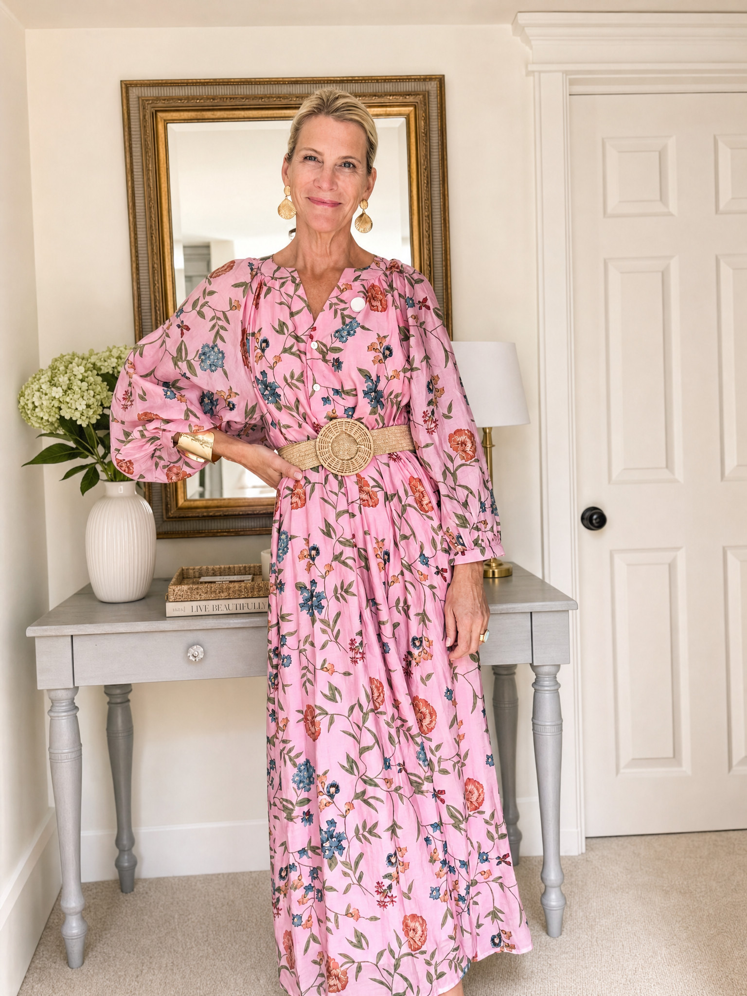This pink floral maxi dress is a standout for weddings, showers, and special events. The flowing silhouette, puff sleeves, and raffia belt create an effortlessly feminine look.

💡 LTK MADE EASY

❤️ Heart = Support my posts
🔖 Save = Get sale & restock alerts
📋 Lists = Keep favorites organized
📲 Share = Send to yourself for later
💬 Comment = Ask me anything 

 #LTKootd #LTKSeasonal #LTKOver40