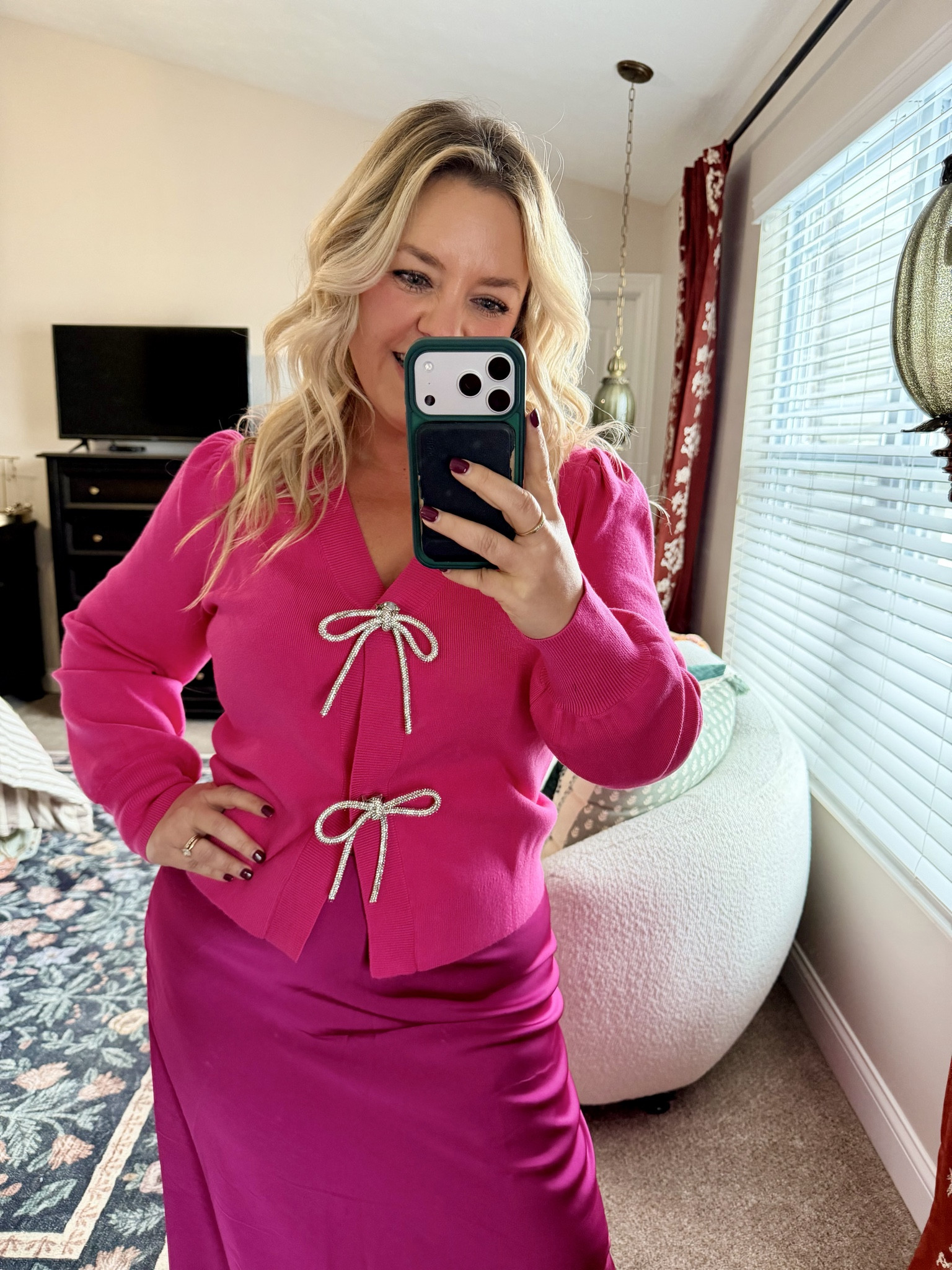 Give me all the monochromatic moments! Rhinestone bow snap cardigan is Amazon - wearing size medium, pink satin skirt is Shein - wearing sz large. So cute together for Christmas or NYE! Also linked another Shein sweater I got to wear with this skirt too!

#LTKFindsUnder50 #LTKHoliday #LTKMidsize