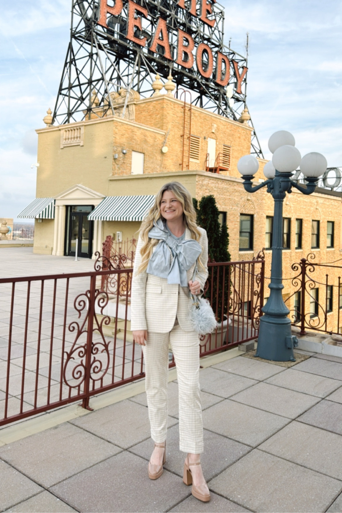I will never say no to a showstopper bow! This bow long sleeve shirt is an investment, but it sure is a good one! I cannot link it, similar ones are linked! This specific top is by Mae New York and the designer is absolutely adorable! I also love how versatile this neutral gingham/plaid suit is by Ann Taylor! Don’t forget to pair any outfit with a statement bag like this one by J. lowery.🩵

#LTKHoliday #LTKSeasonal #LTKStyleTip