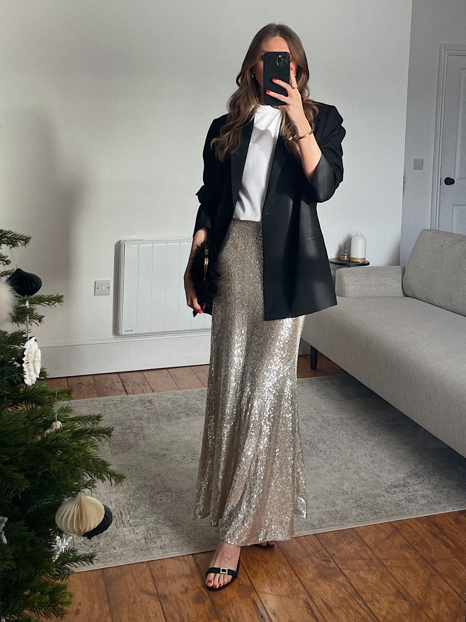 Dressy Christmas Day outfit ideas
M&S white t-shirt, size 12
Totême black blazer. Exact and similar linked
H&M silver sequin skirt
Blarely there heels
Feather bag 



#LTKeurope #LTKHoliday #LTKSeasonal