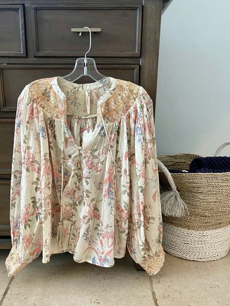 Flowy floral top that looks much more expensive than it is. Size down, runs big. Pretty colors for spring. Great with jeans, slacks for work or shorts as the weather warms up 
Smocked flowy top 
Joie look for less from Anthropologie 
$98 

#LTKSeasonal #LTKworkwear