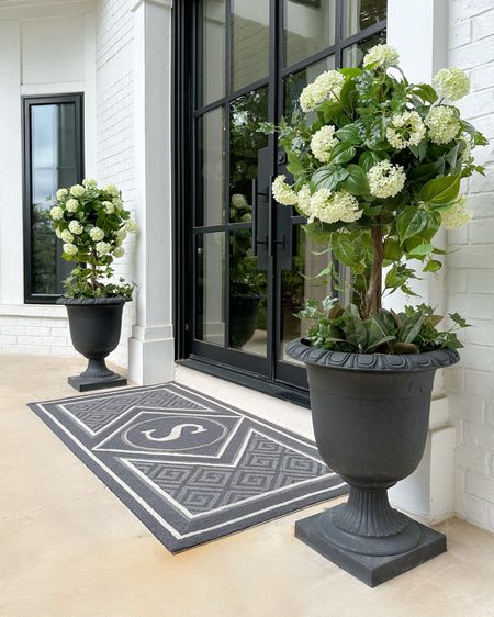 Front porch decor refresh with Frontgate! #frontgatepartner 

These flowering faux toparies are so realistic and absolutely stunning! And I love the size of this pretty monogrammed doormat in Gray. Frontgate has so many great pieces for getting your outdoor space ready for spring entertaining! #frontgate

#LTKHome #LTKSeasonal #LTKSaleAlert