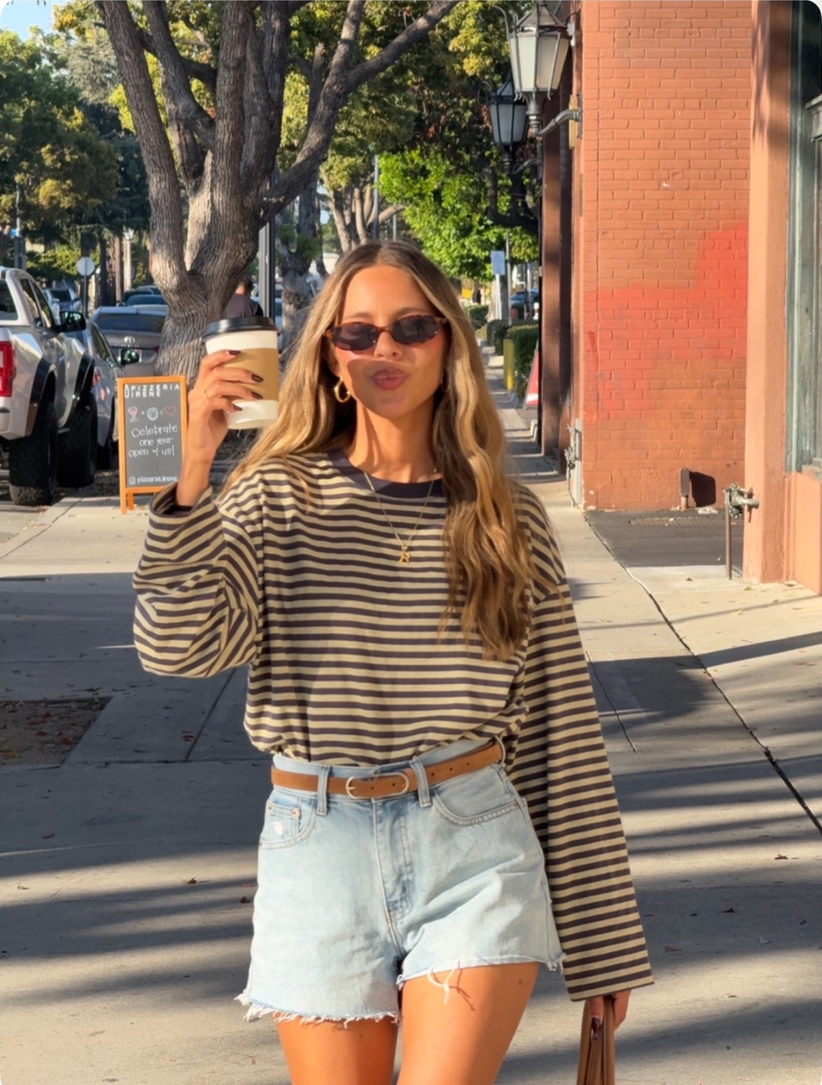 WHAT I’M WEARING: 
Amazon top- size small
Denim shorts- size 24 
Belt- Abercrombie 
Boots - dolce vita this exact style is sold out so linking similar! 